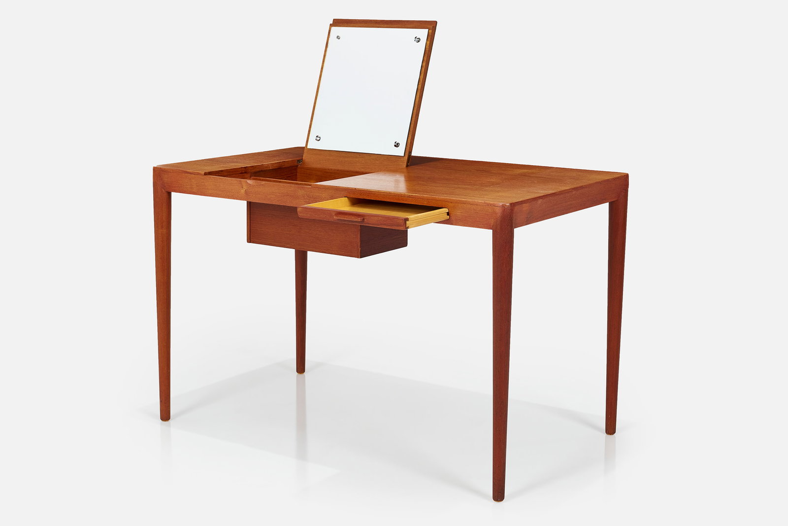 Severin Hansen Jr., Vanity: SEVERIN HANSEN JR. Vanity, ca. 1955 Teak, mirrored glass, chrome-plated metal. Manufactured by Haslev Mobelsnedkeri A/S, Denmark. Underside with manufacturer's label. 27.75"