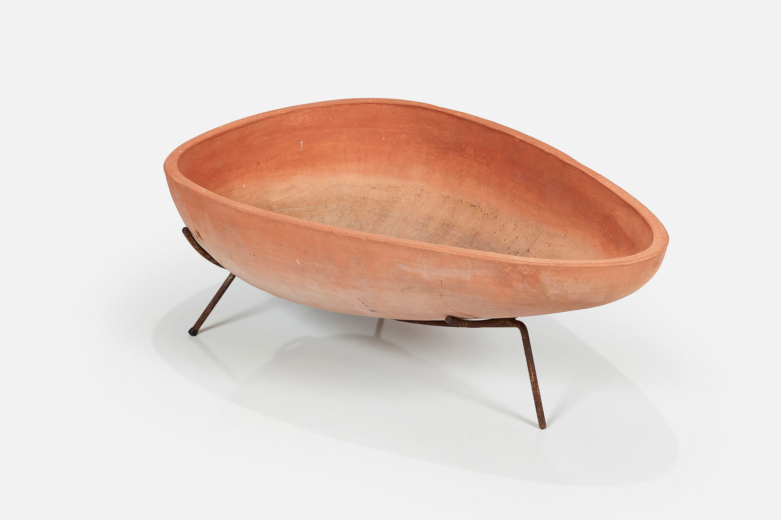 John Follis + Rex Goode, 'Pig' Planter: JOHN FOLLIS + REX GOODE Pig planter, model no. G99L, ca. 1955 Unglazed earthenware, iron. Manufactured by Architectural Pottery, USA. 15" H x 26" W x 41" D