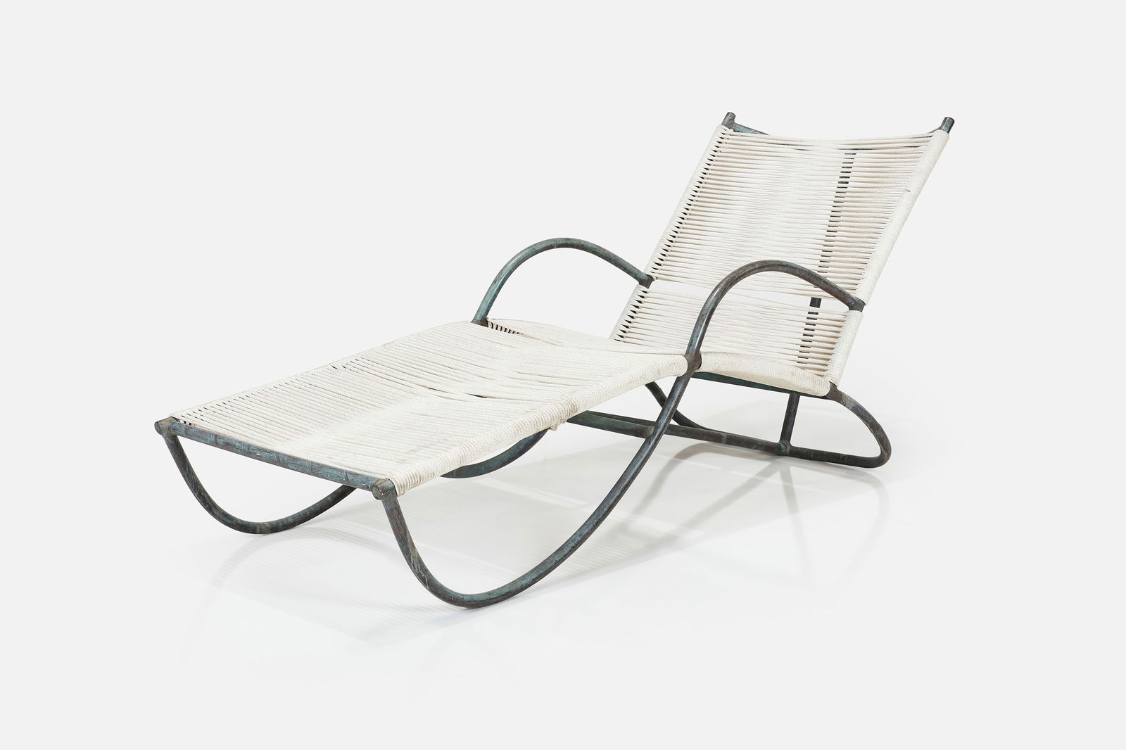 Walter Lamb, Chaise Lounge: WALTER LAMB Chaise lounge, model no. C-4700, ca. 1952 Tubular bronze, cotton rope. Manufactured by Brown Jordan, USA. 31.75" H x 24" W x 64" D Seat height: 12"