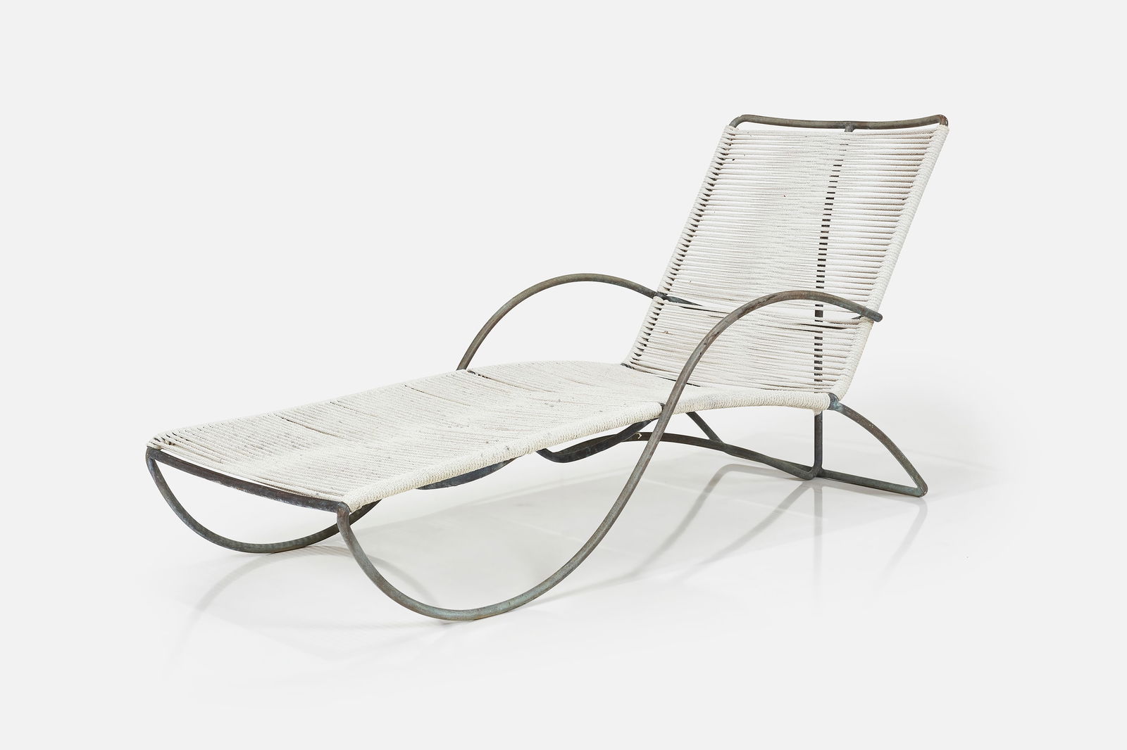 Walter Lamb, Chaise Lounge: WALTER LAMB Chaise lounge, model no. C-4700, ca. 1952 Tubular bronze, cotton rope. Manufactured by Brown Jordan, USA. 32.5" H x 25.5" W x 64" D Seat height: 12"