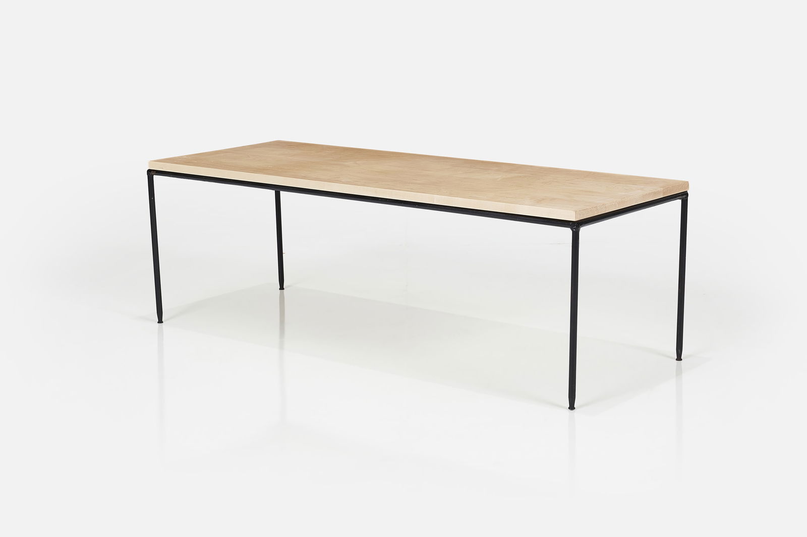 Paul McCobb, 'Planner Group' Coffee Table: PAUL MCCOBB 'Planner Group' coffee table, 1950s Birch, painted iron. Manufactured by Winchendon, USA. 16" H x 48" W x 18" D