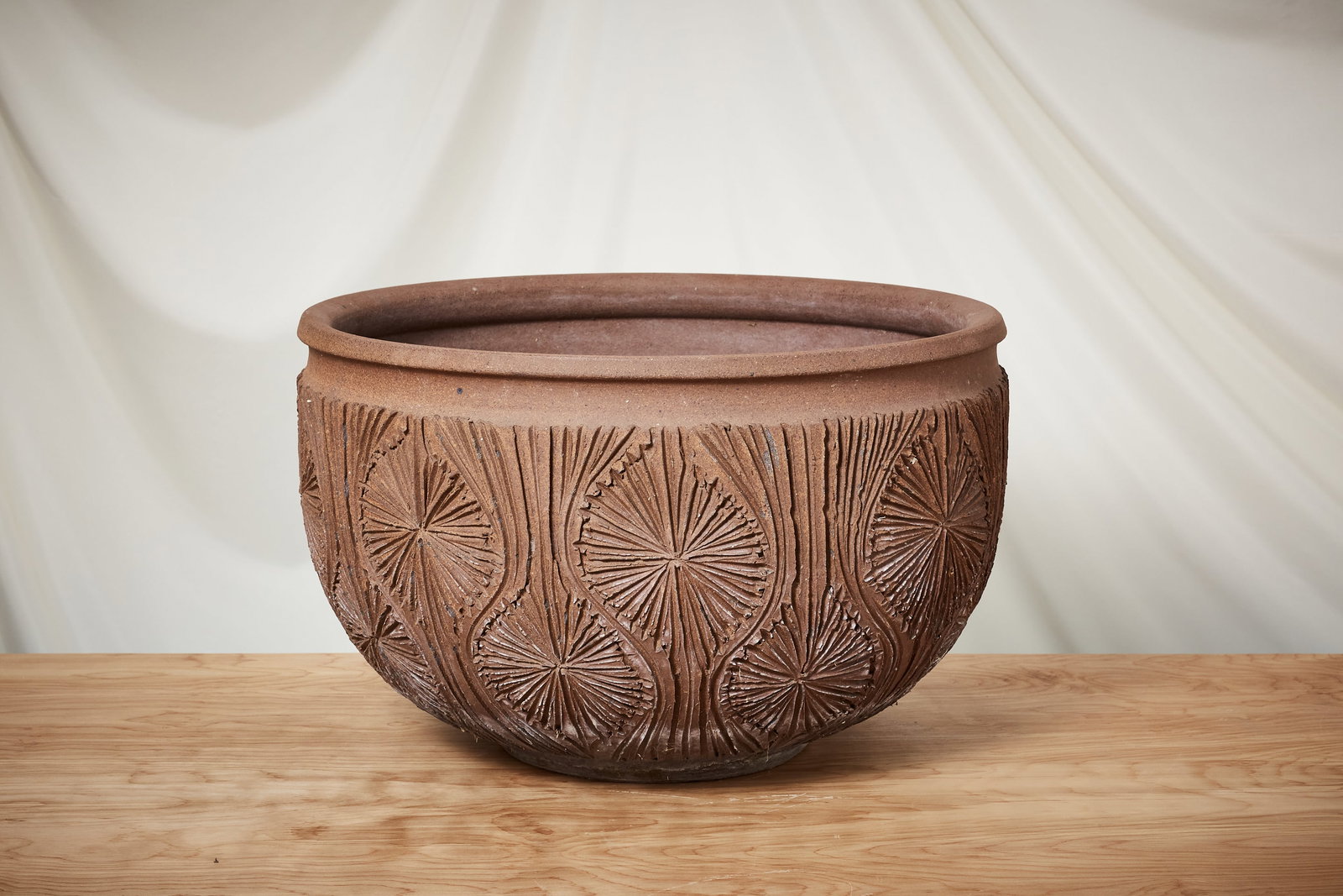 Robert Maxwell + David Cressey, Large 'Teardrop Sunburst' Planter: ROBERT MAXWELL + DAVID CRESSEYLarge 'Teardrop Sunburst' planter, ca. 1977Unglazed stoneware. Studio-made for Earthgender Ceramics, USA. 14.5" H x 23" Diameter Prov