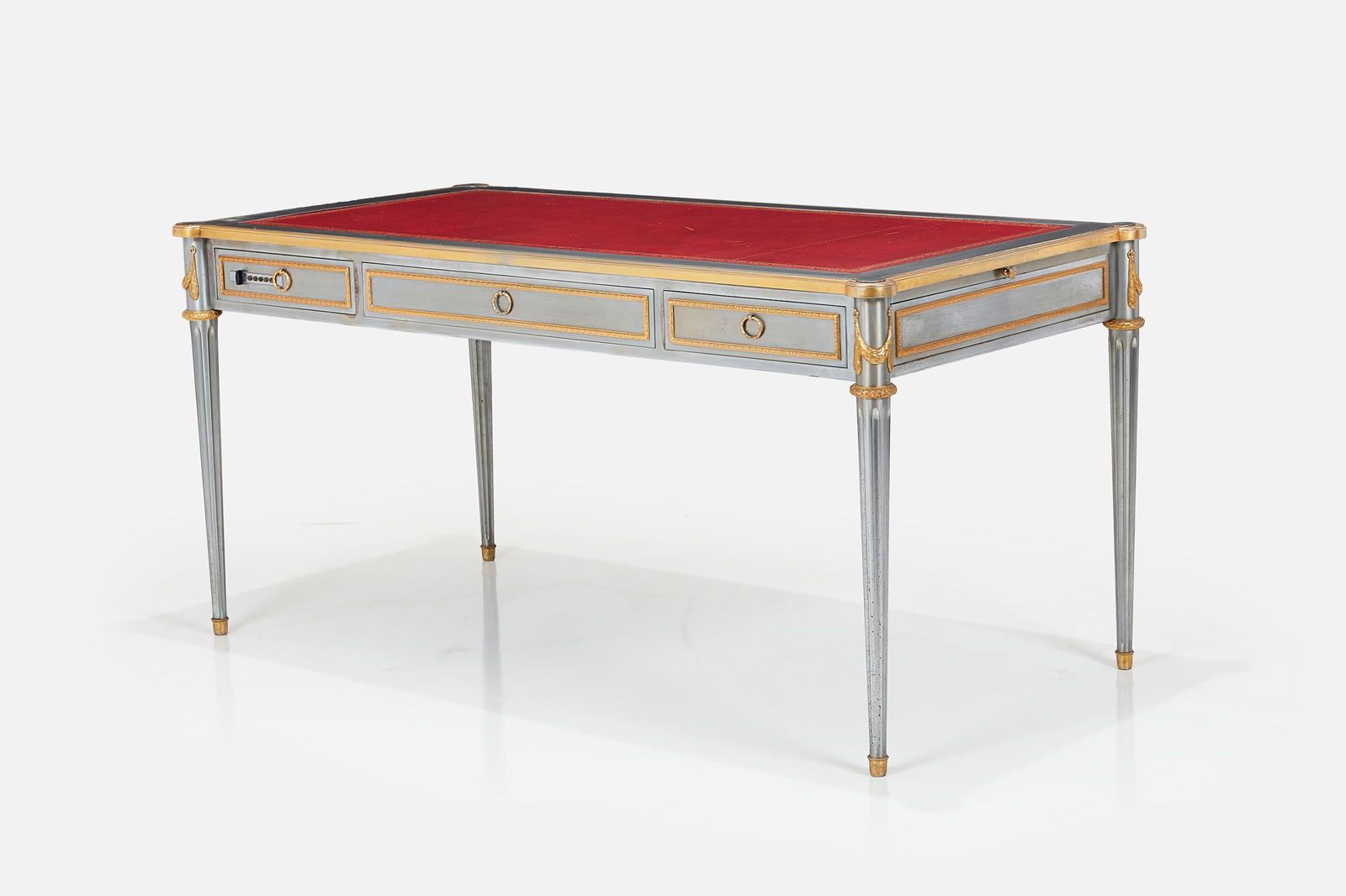 John Vesey, Louis XVI Style Desk: JOHN VESEYLouis XVI style desk, model no. V-60, ca. 1960Stainless steel, brass, leather, suede. Produced in the USA. 30" H x 63" W x 33" D
