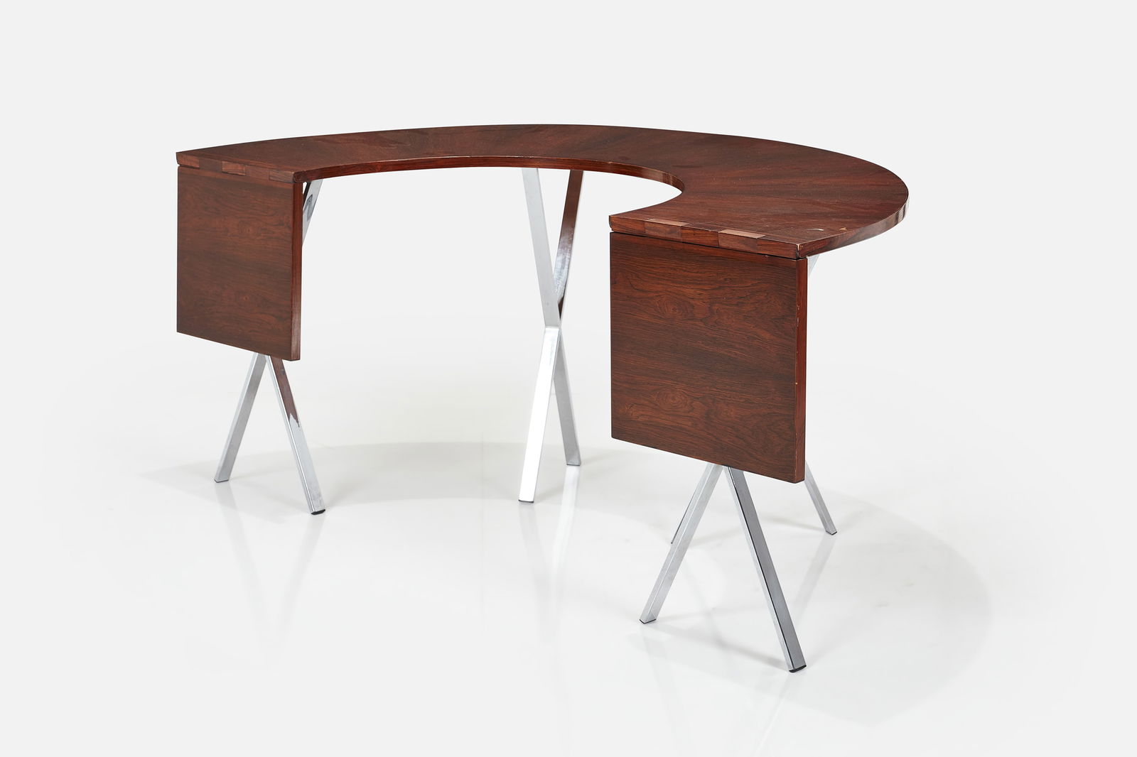 Rilis Antonsen, Drop-Leaf Table: RIIS ANTONSENDrop-leaf table, ca. 1965Rosewood-veneered wood, chrome-plated steel, brass. Manufactured by Riis-Antonsen, Denmark.Underside with branded mark "RIIS-ANTONSEN/MADE IN DENMARK" a