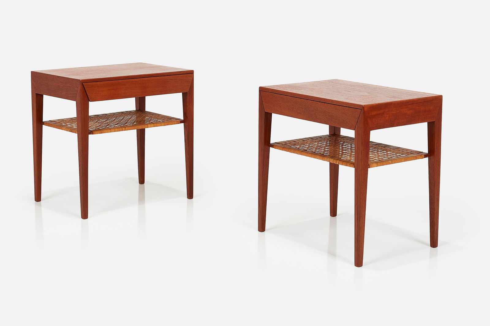 Severin Hansen Jr., Nightstands (2): SEVERIN HANSEN JR.Pair of nightstands, model no. 35, ca. 1965Teak, cane. Manufactured by Haslev Mobelsnedkeri A/S, Denmark.Underside of one drawer impressed "MADE IN DENMARK" and both s