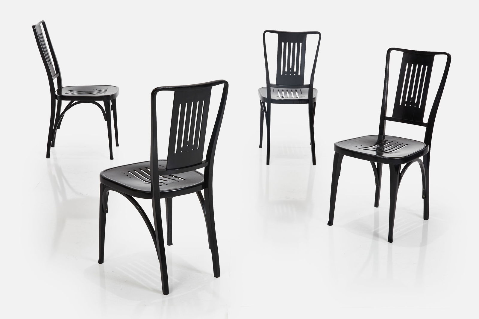 Josef Hoffman, Rare Dining Chairs (4): JOSEF HOFFMANSet of four dining chairs, 1920sLacqered wood. Produced in Austria. Each: 37" H x 17" W x 23" DSeat height: 18"