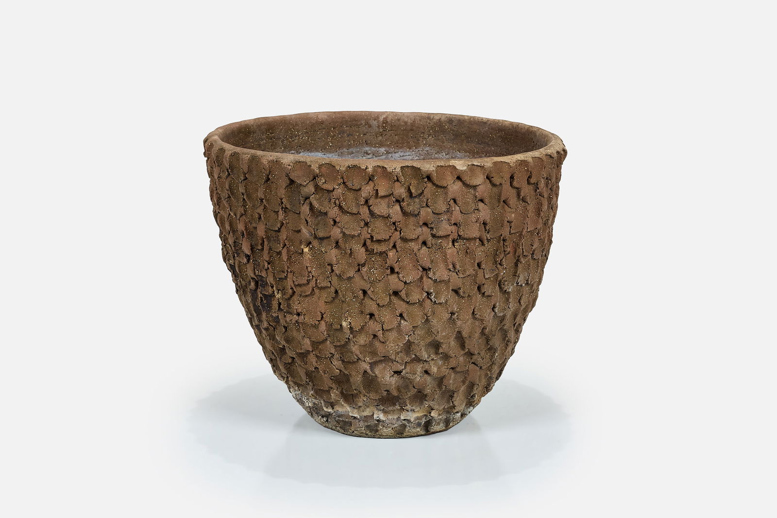 Stan Bitters, Crude 'Thumb' Planter: STAN BITTERSCrude 'Thumb' planterUnglazed stoneware. Studio-made, Fresno, CA. 16" H x 19" Diameter