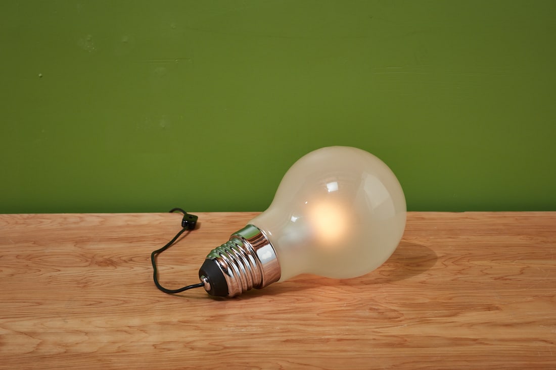 Ingo Maurer, 'Thomas Alva Edison' Lamp: INGO MAURER'Thomas Alva Edison' table lamp, 1979Chrome-plated metal, opaline glass. Produced by Design M, Germany. 13.5" H x 8.5" Diameter