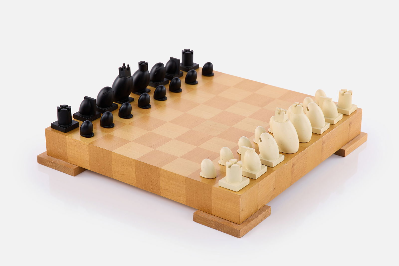 Michael Graves, Chess / Checkers Set: MICHAEL GRAVESChess / checkers set, 2002Maple, resin, felt. Produced for Target, USA.Underside of box and of each chess piece marked with "Graves" facsimile signature. 3" H x 18&