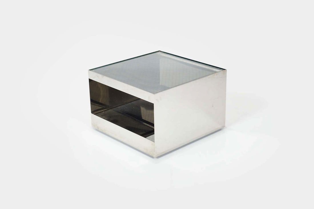 Joe D'Urso, Low Rolling End Table: JOE D'URSOLow rolling end table, model no. 6022, ca. 1980Mirror-polished steel, security glass. Manufactured by Knoll, USA. 14.5" H x 22" W x 22" D