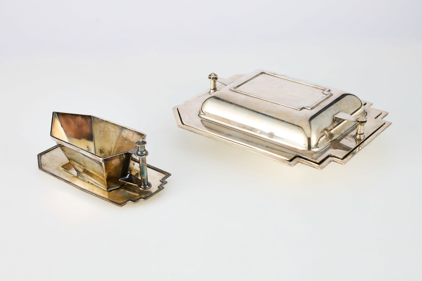 Louis W. Rice, 'Skyscraper' Serveware Set (2): LOUIS W. RICE 'Skyscraper' serveware, model nos. 5251, 5252, ca. 1928Silverplate. Manufactured by Bernard Rice's Sons, Inc., USA, from the Apollo Skyscraper line.Each impressed with m