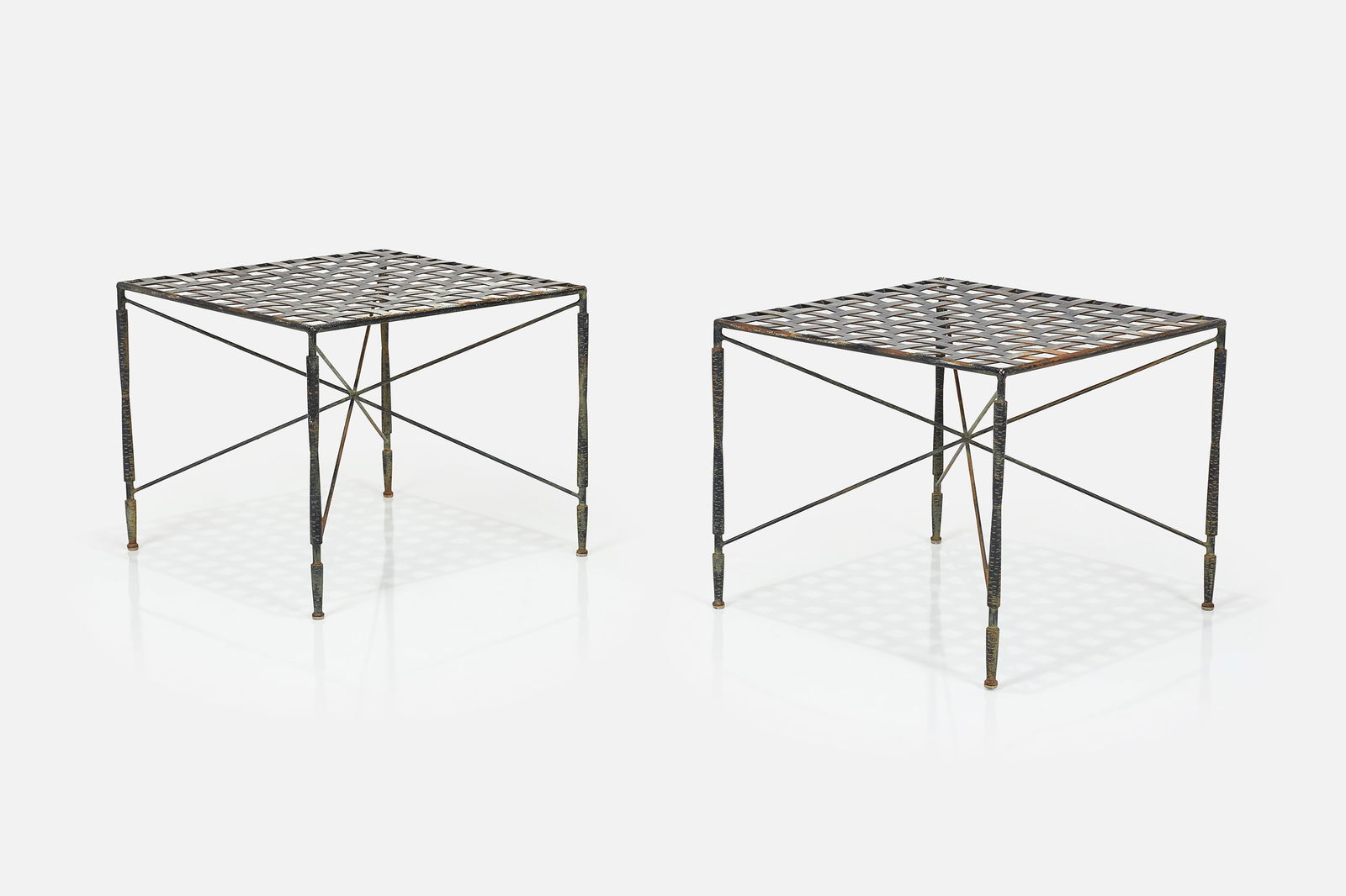 Mario Papperzini, 'Amalfi' Side Tables (2): MARIO PAPPERZINIPair of 'Amalfi' side tables, 1950sPatinated iron. Manufactured by Brown Jordan, USA. Each: 14" H x 22" W x 20.75" D