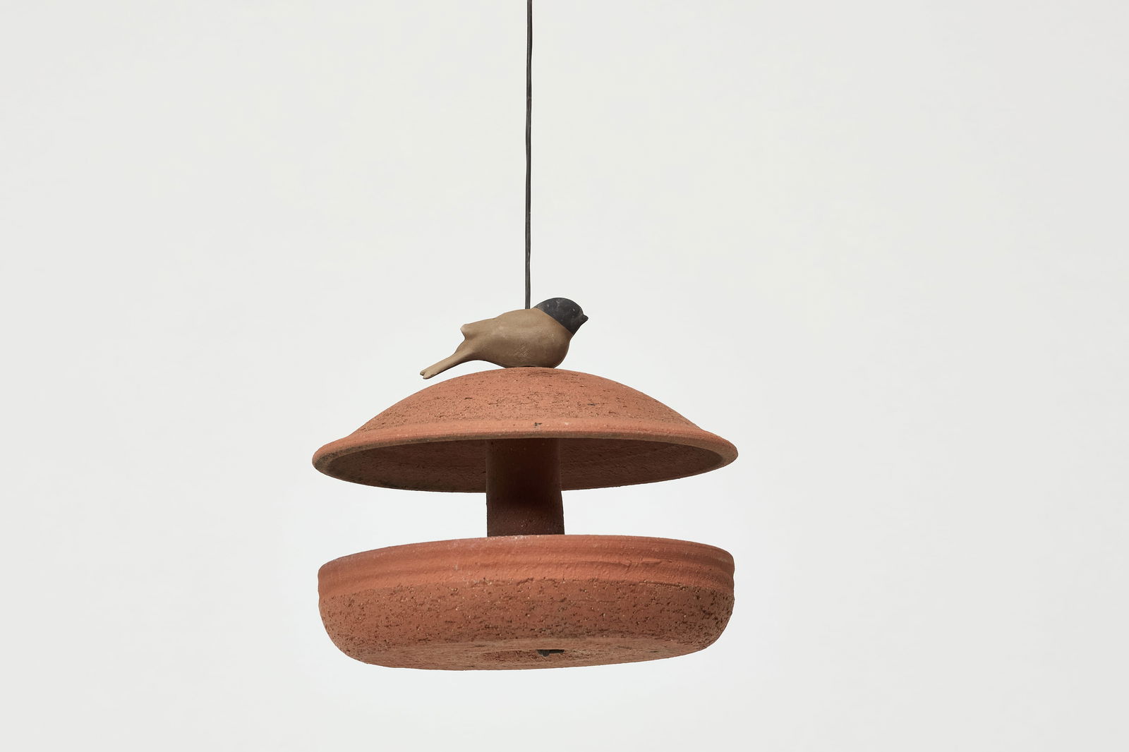 Stan Bitters, Birdfeeder: STAN BITTERSBird feederPartially-glazed stoneware, plastic cord. Studio-made, Fresno, CA. 44" H x 10" Diameter