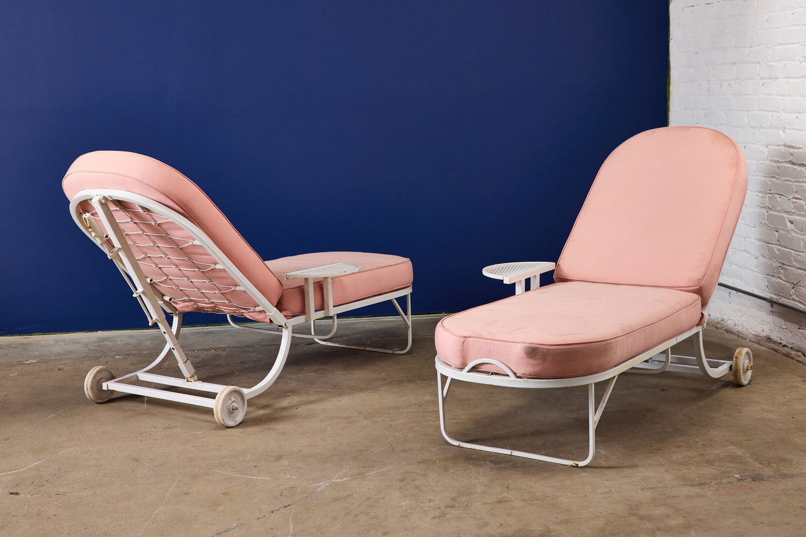 Beverly Hills Hotel, Patio Lounges (2): BEVERLY HILLS HOTELPair of patio lounge chaises, 1970sPainted metal, fabric. Each: 18.5" H x 32" W x 72" DSeat height: 16.5" Provenance: Beverly Hills Hotel, Beverly Hills, CA