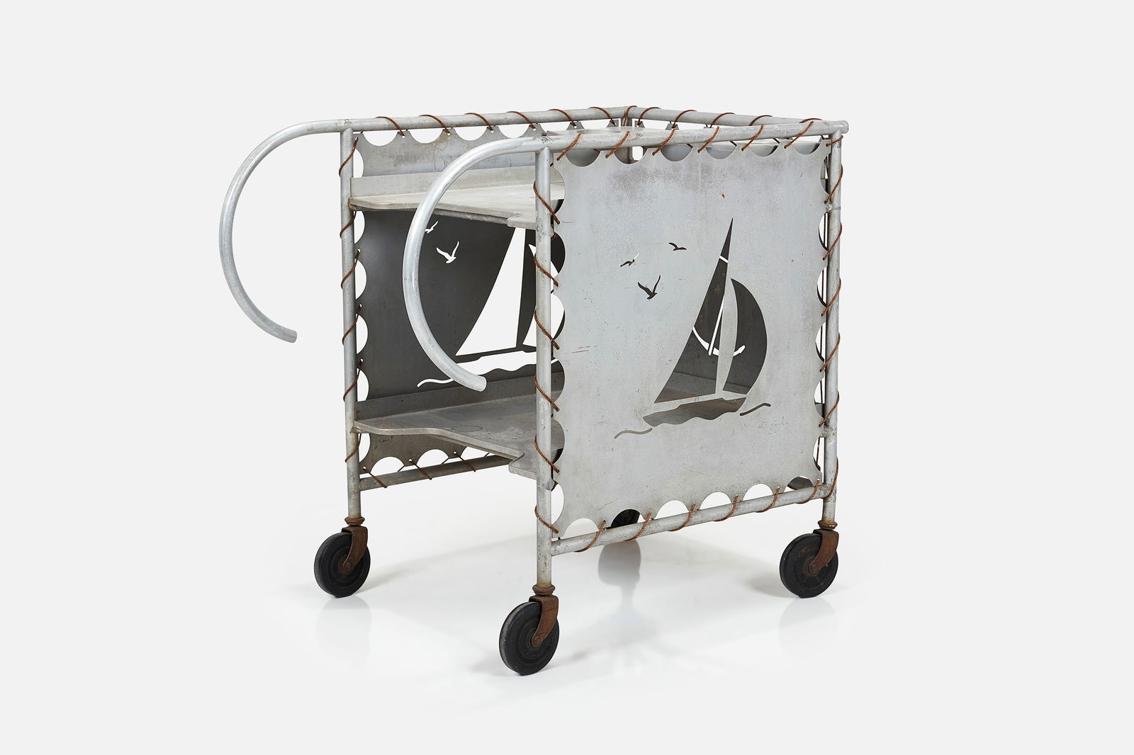 Nautical, Bar Cart: NAUTICALBar cart, 1940sAluminum, nylon rope, casters. 36.75" H x 25" W x 39.5" D