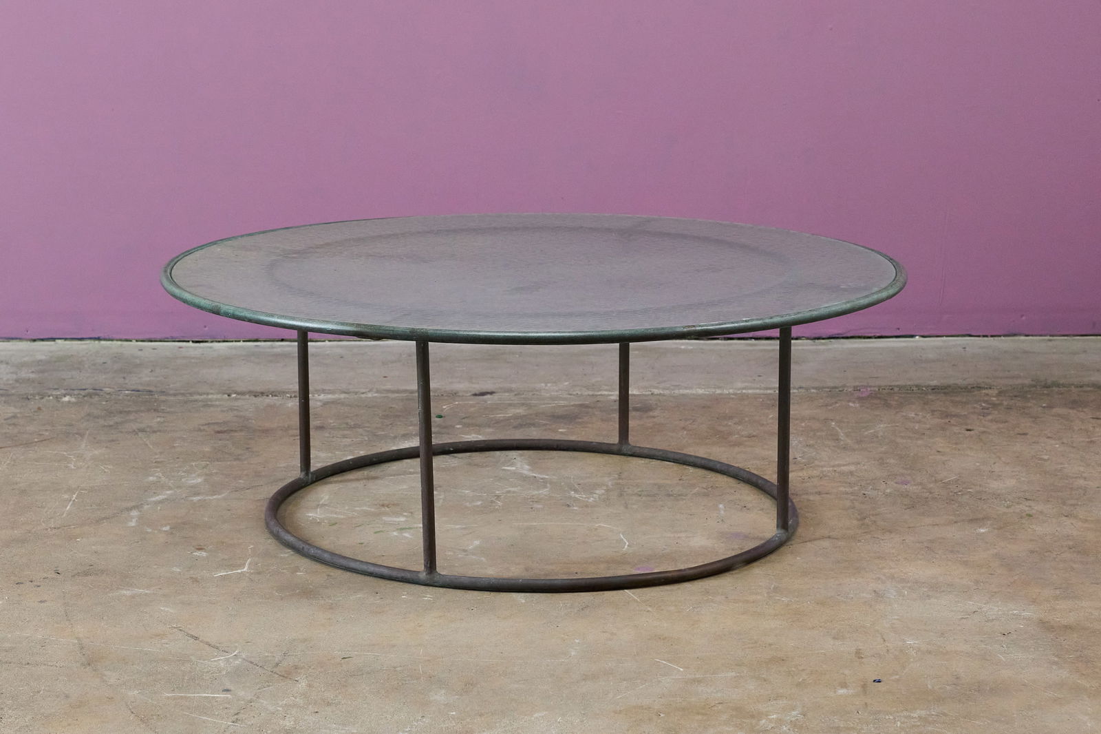 Walter Lamb, Coffee Table: WALTER LAMBCoffee table, 1950sTubular bronze, textured glass. Manufactured by Brown Jordan, USA. 17" H x 48.5" Diameter