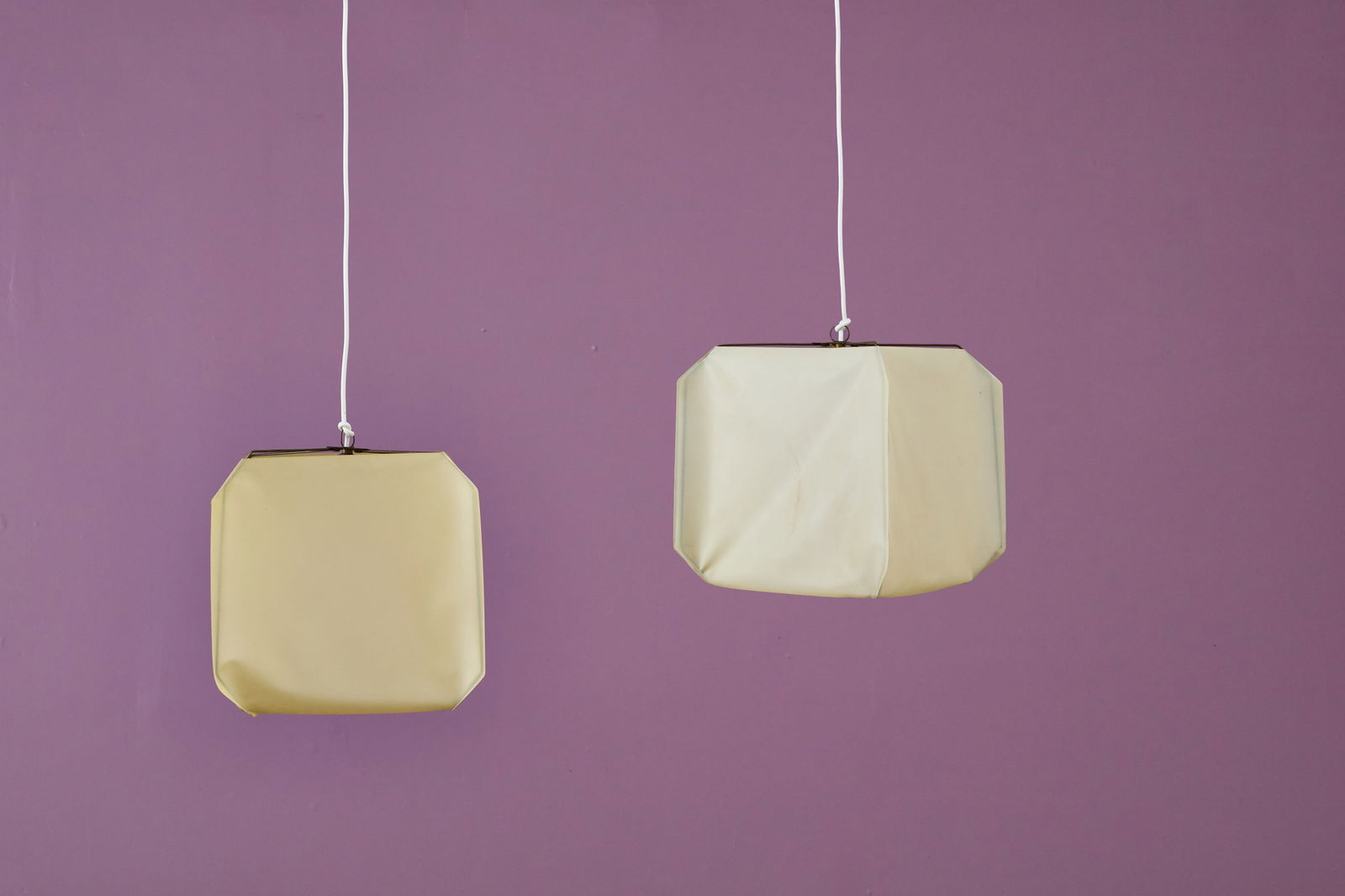 Bruno Munari, 'Bali' Pendant Lamps (2): BRUNO MUNARIPair of 'Bali' pendant lamps, 1958 / 1970sPlastic, brass. Manufactured by Danese, Italy.Interior brass plate impressed with manufacturer's mark. Each: 13" H &t