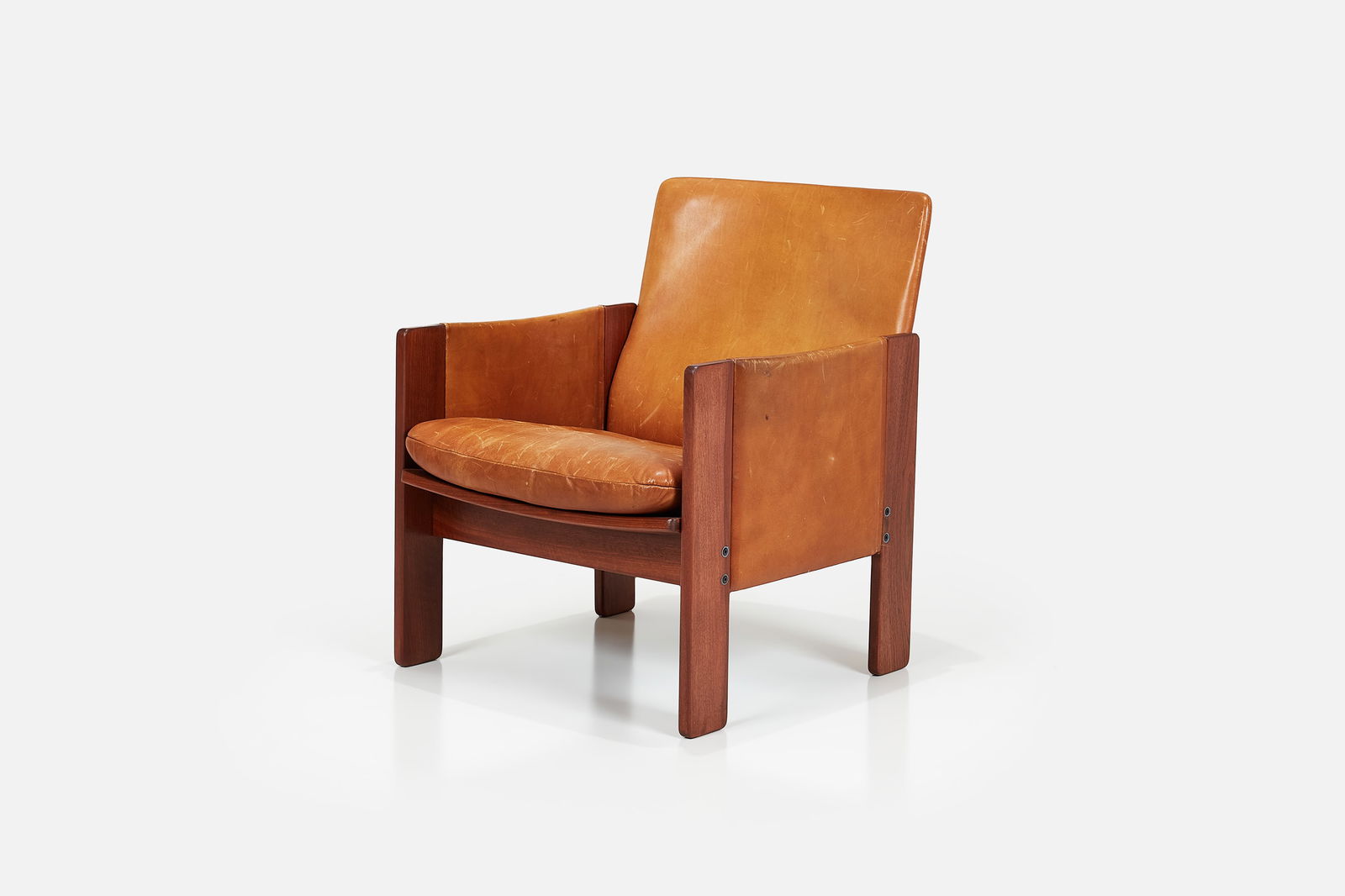 Afra + Tobia Scarpa, Lounge Chair: AFRA + TOBIA SCARPALounge chair, model no. 917, 1960sWalnut, leather. Manufactured by Cassina, Italy and imported by Atelier International, USA.Underside with manufacturer and retailer labels. 