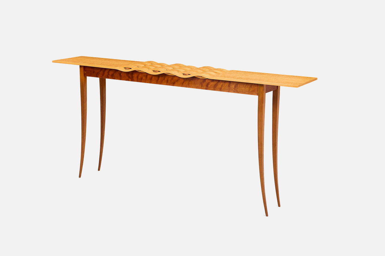 Thomas Stender, Console Table: THOMAS STENDERConsole table, 1989Maple, birch. Studio-made, USA.Underside with incised signature, date and "#5". 30" H x 65.25" W x 11.25" D 