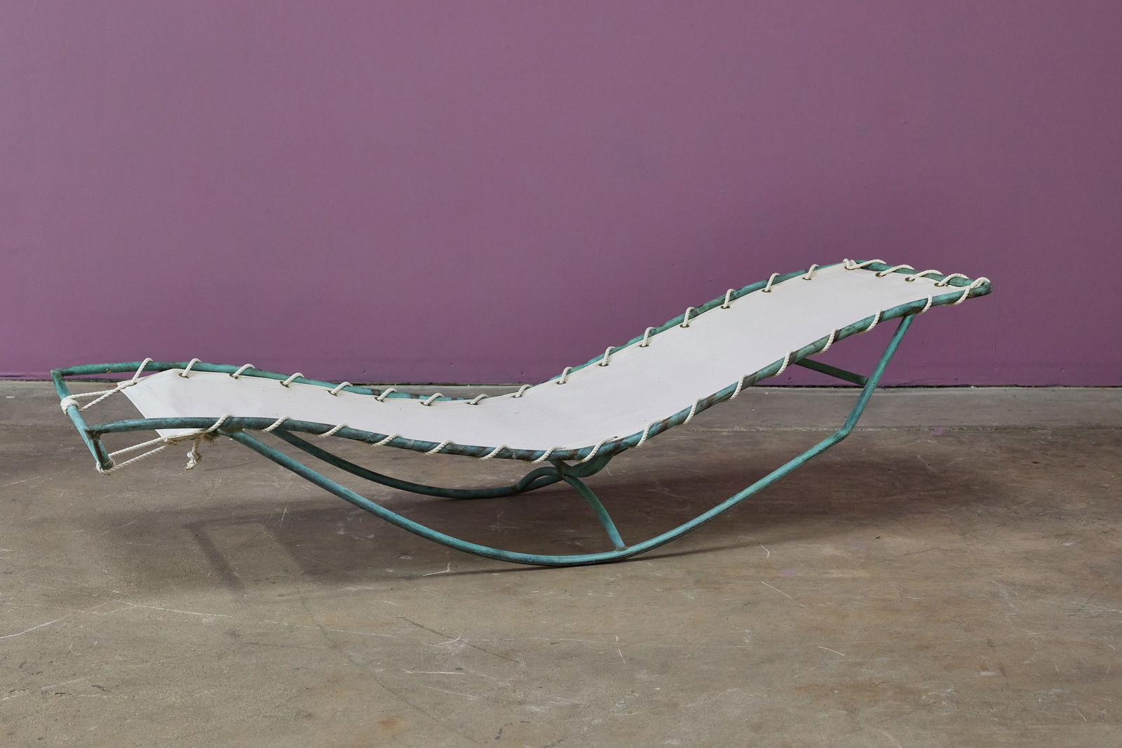Walter Lamb, 'Waikiki' Rocking Chaise Lounge: WALTER LAMB 'Waikiki' rocking chaise, 1950s Tubular bronze, cotton/nylon cord. Manufactured by Brown Jordan, USA. 25" H x 21" W x 69" D