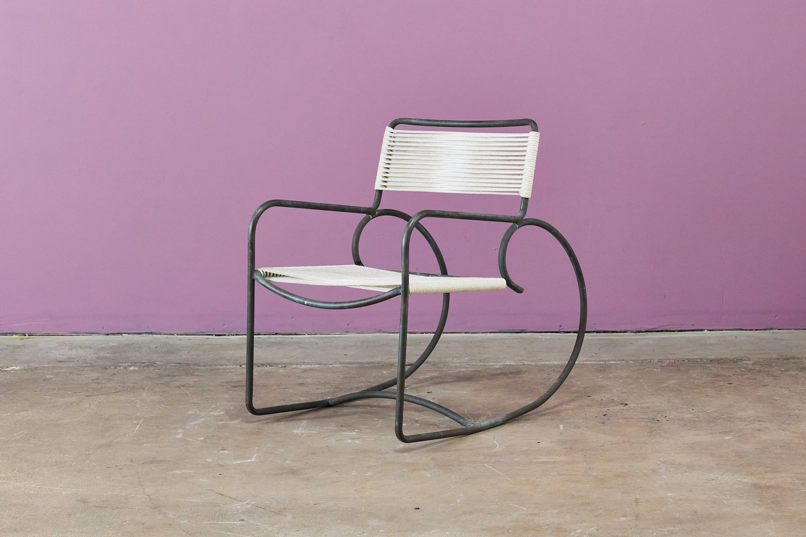 Walter Lamb, Rocking Chair: WALTER LAMBRocking chair, model no. C-5701, 1950sTubular bronze, cotton/nylon cord. Manufactured by Brown Jordan, USA. 31.5" H x 21.5" W x 32" DSeat height: 16"