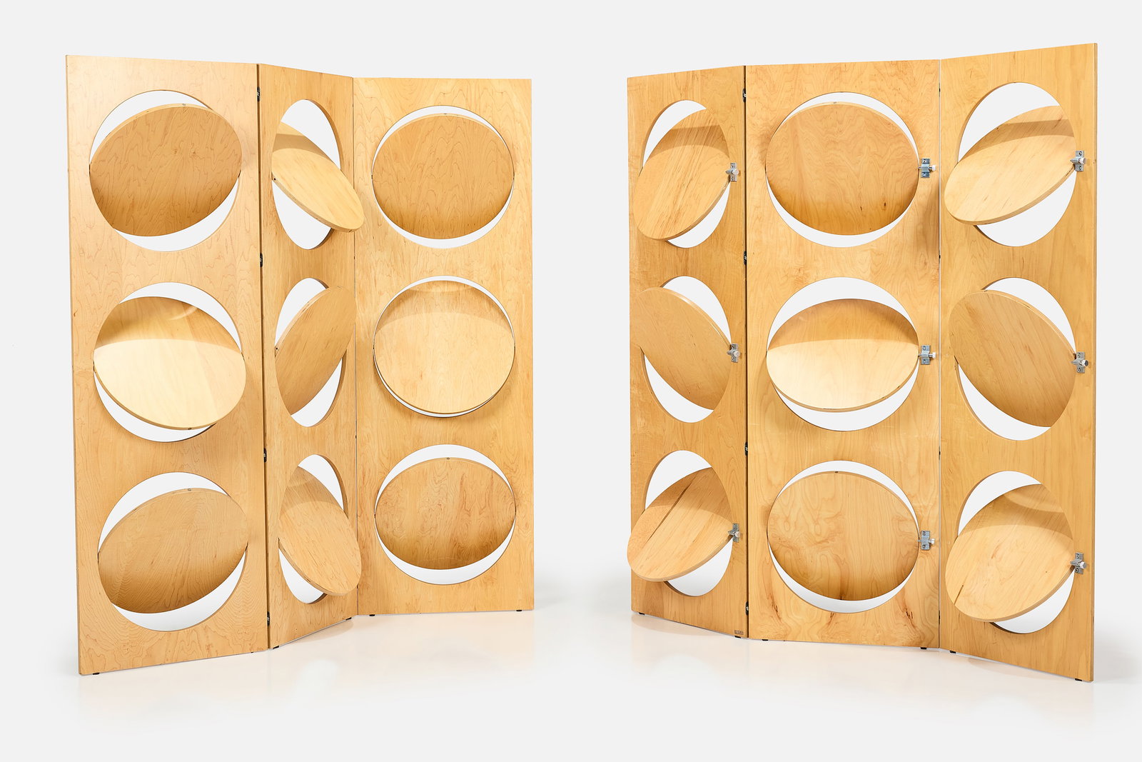 Keno Brothers, 'Peekaboo' Screens (2): KENO BROTHERS Pair of 'Peekaboo' screens, 1990s Birch plywood, steel. Manufactured by Theodore Alexander, USA. Each: 72" H x 72" W x 19" D