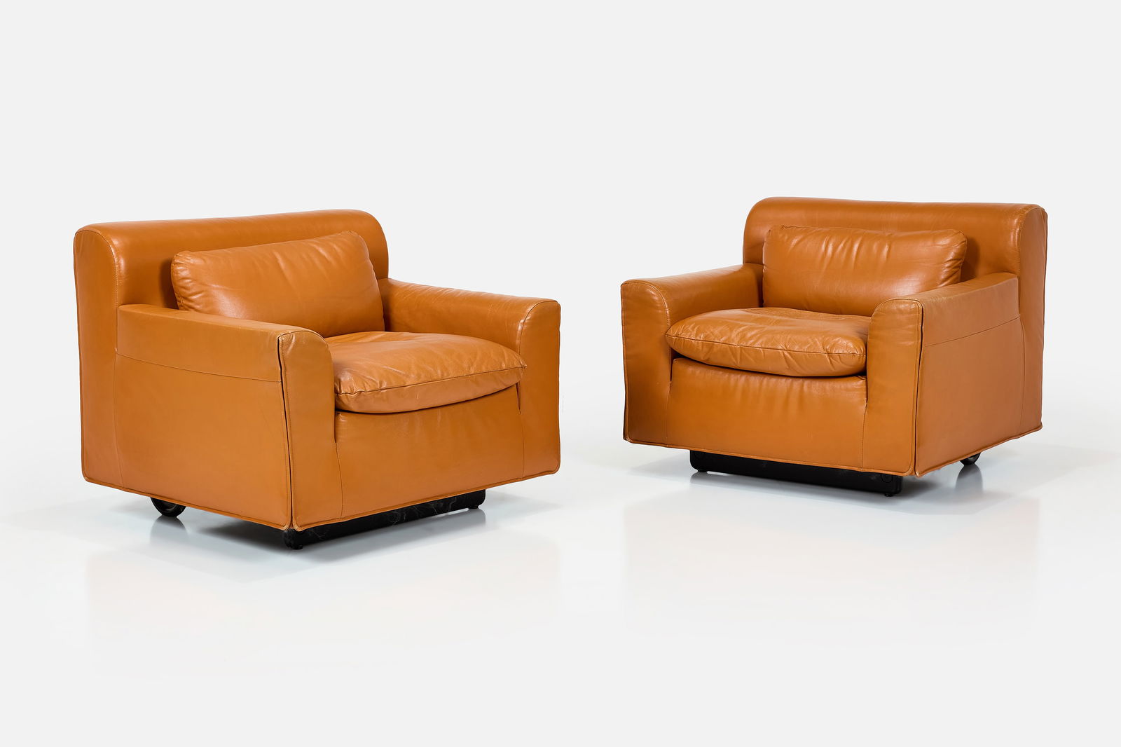 Otto Zapf, 'Heli' Lounge Chairs (2): OTTO ZAPFPair of 'Heli' lounge chairs, 1990Leather, lacquered wood, enameled aluminum. Manufactured by Knoll International, Czechoslovakia / USA,Underside with Knoll with dated