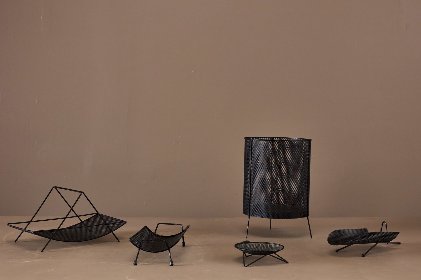 Richard Galef, 'Ravenware' Collection (5): RICHARD GALEFCollection of five 'Ravenware' objects, 1952-1955Painted perforated metal, rubber. Distributed by Raymor, USA. Wastebasket: 15.5" H x 11" DiameterAshtray: 2"