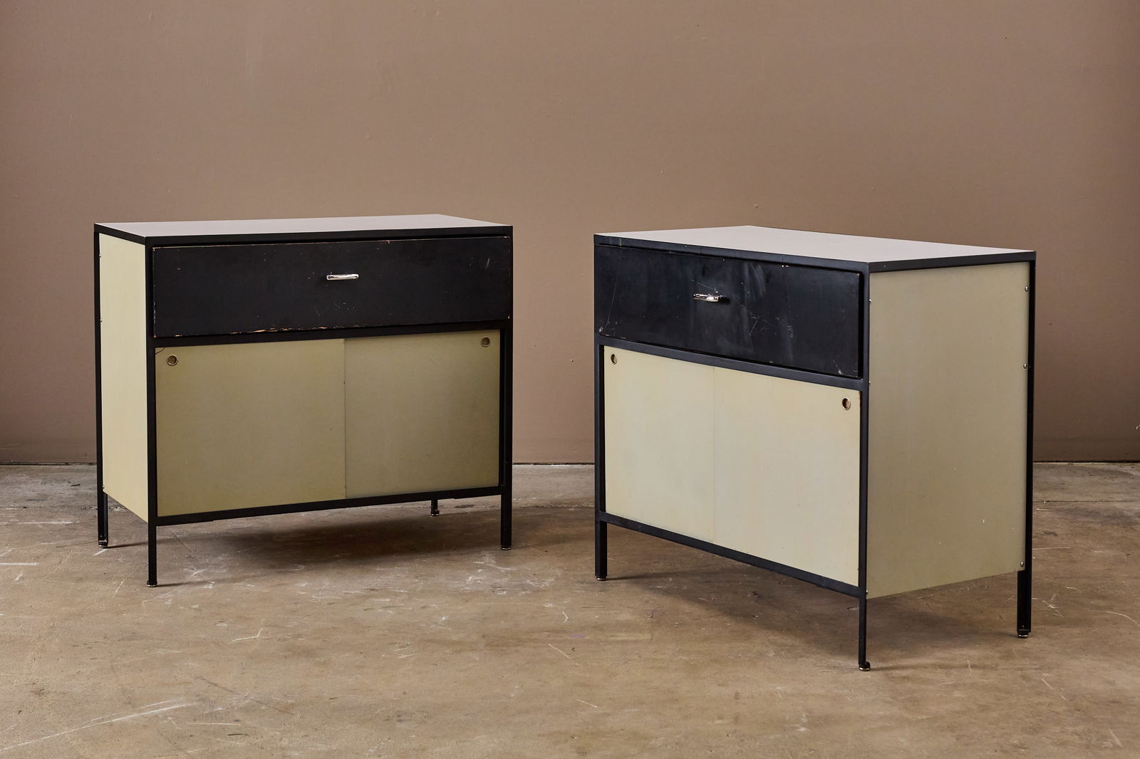 George Nelson + Associates, 'Steelframe' Dressers (2): GEORGE NELSON + ASSOCIATESPair of 'Steelframe' dressers, 1950sPainted steel, plastic laminate, painted wood, painted masonite, chrome-plated metal. Manufactured by Herman Miller, USA. E