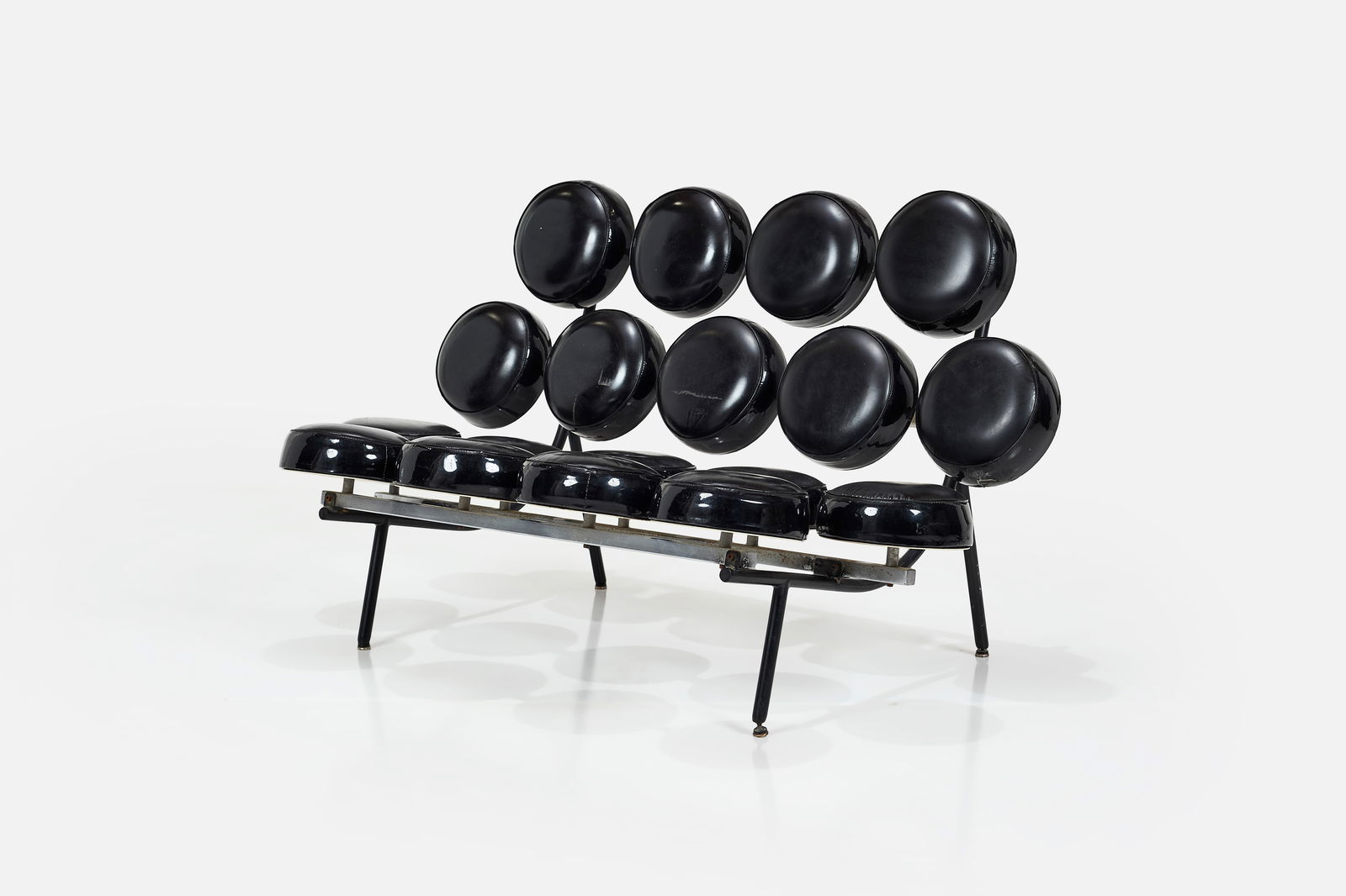 George Nelson + Associates, 'Marshmallow' Sofa: GEORGE NELSON + ASSOCIATES'Marshmallow' sofa, 1980sVinyl, enameled steel, chrome-plated steel. Manufactured by Herman Miller, USA.Back bar with manufacturer's label. 30" H x 50