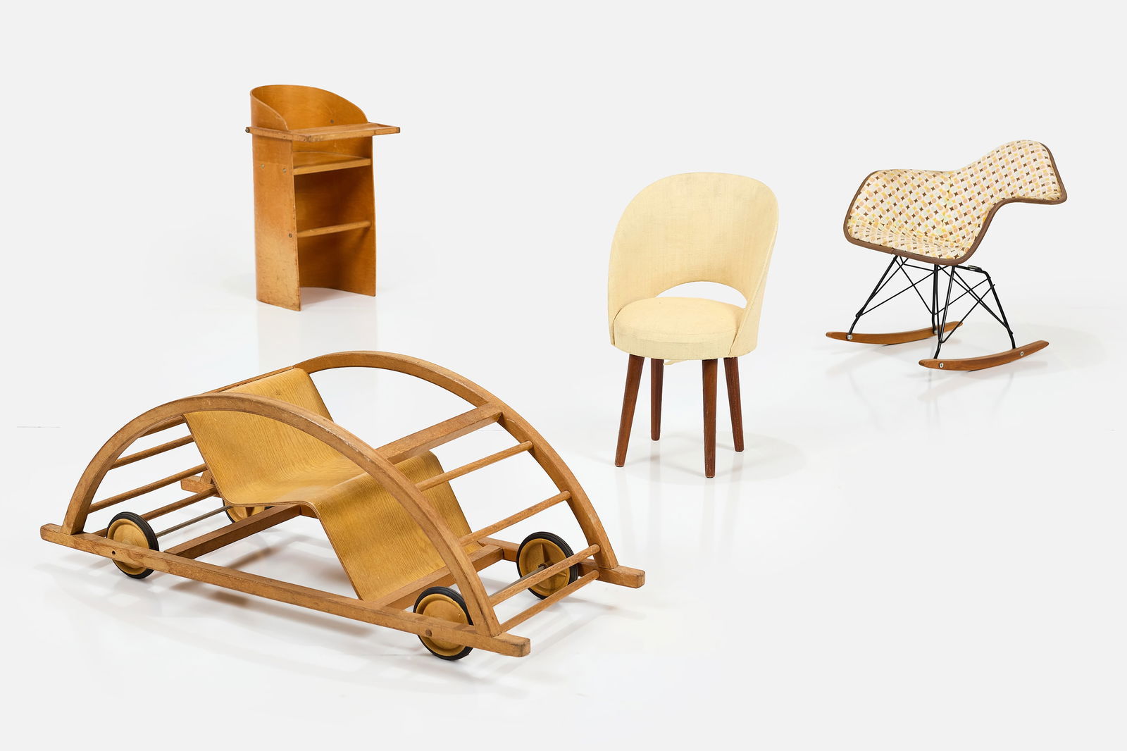 Modern, Children's Furniture (4): MODERNGroup of four children's chairs, 1950sFiberglass, wood, fabric. Largest: 15" H x 15" W x 36" D