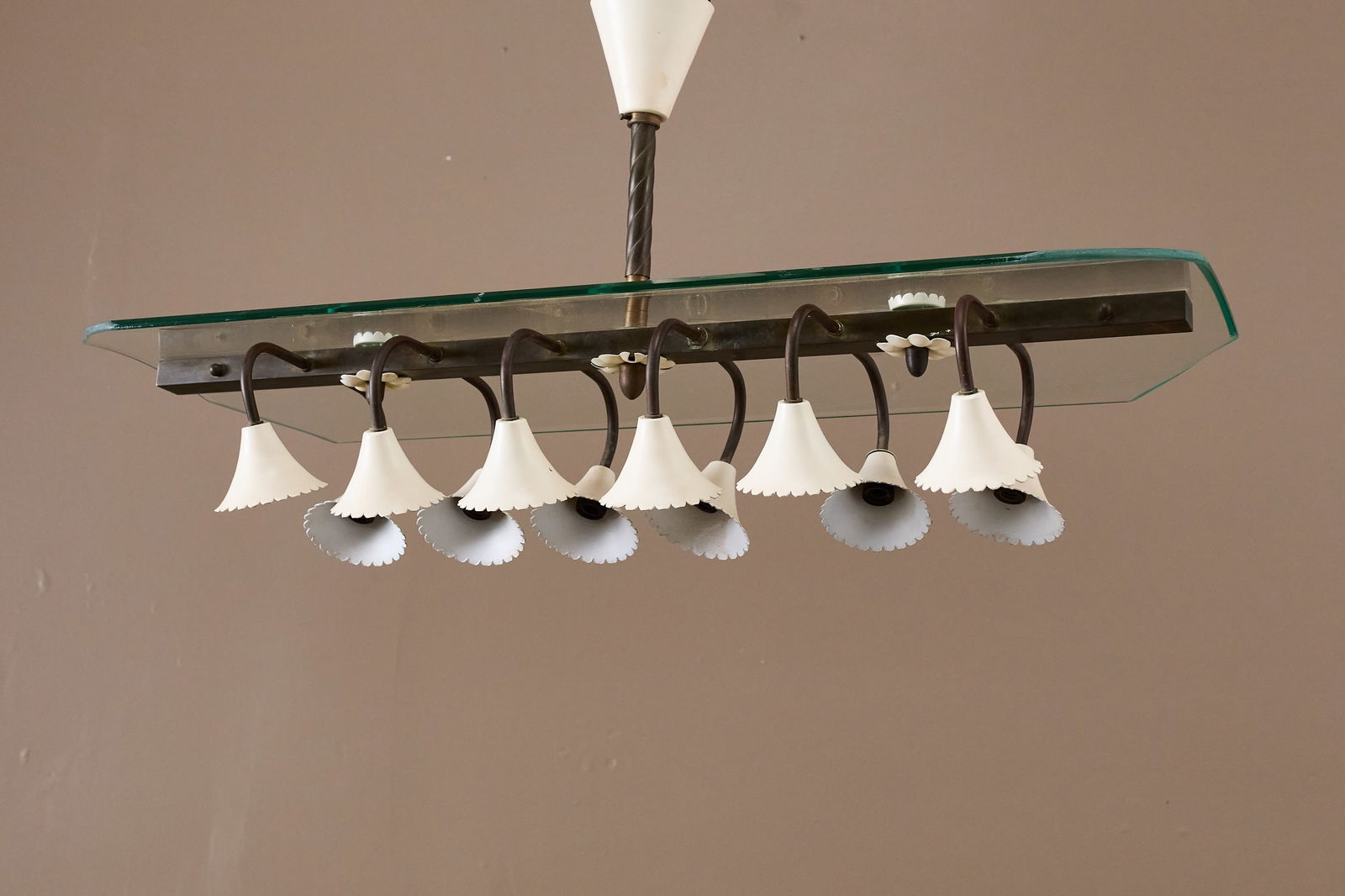 Italian, 12-Light Chandelier: ITALIANTwelve-light chandelier, 1950sGlass, brass, painted metal. 16.5" H x 32" W x 13.5" D