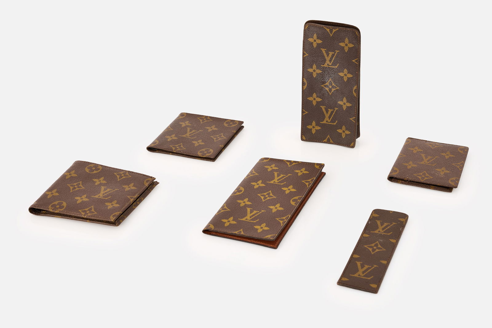 Louis Vuitton, Accessories (6): LOUIS VUITTONCollection of six accessories, 1970s-80sMonogram canvas, leather. Manufactured by Louis Vuitton, France.Each impressed "LOUIS VUITTON/PARIS/made in france".Comprising two wallet