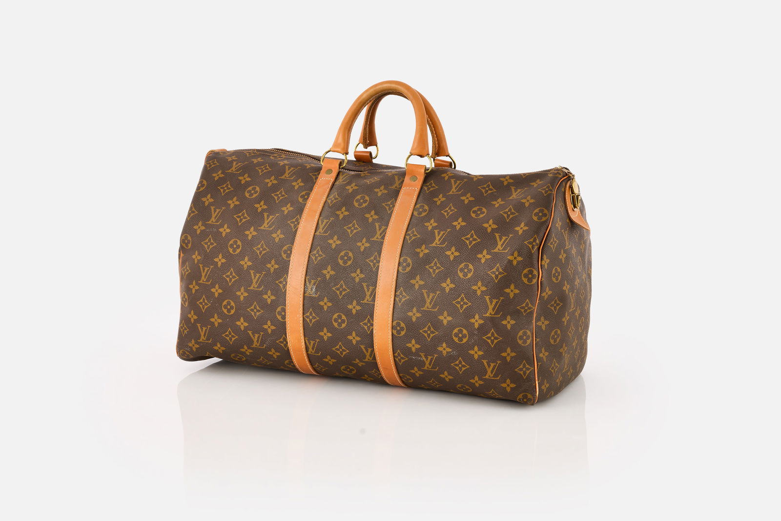 Louis Vuitton / French Co., Duffel Bag: LOUIS VUITTONDuffel bag, 1976-1991Leather, canvas. Manufactured by The French Co., USA under license of Louis Vuitton, France. Interior with paper label "LOUIS VUITTON / MANUFACTURED IN THE