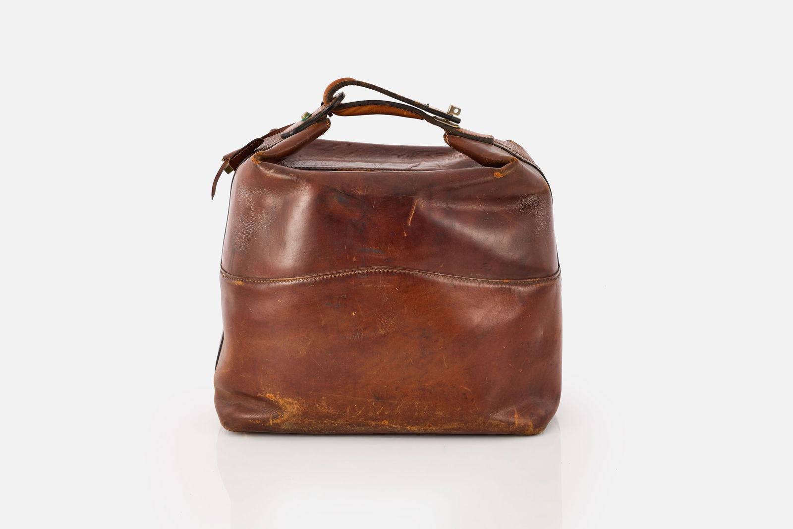 Gucci, Doctor / Travel Bag: GUCCITravel / doctor bag, ca. 1950Leather, plated brass. Produced by Gucci, Italy.Interior with embossed leather manufacturer's label and hardware impressed "GUCCI". 12" H x
