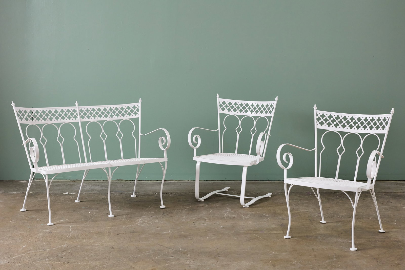 John Salterini, 'Taj Mahal' Seating Set (3): JOHN SALTERINIThree-piece 'Taj Mahal' seating set, 1950sPowder-coated wrought iron. Manufactured by Salterini, USA.Comprising a bench, armchair, and bounce reclining armchair. Chairs: 3