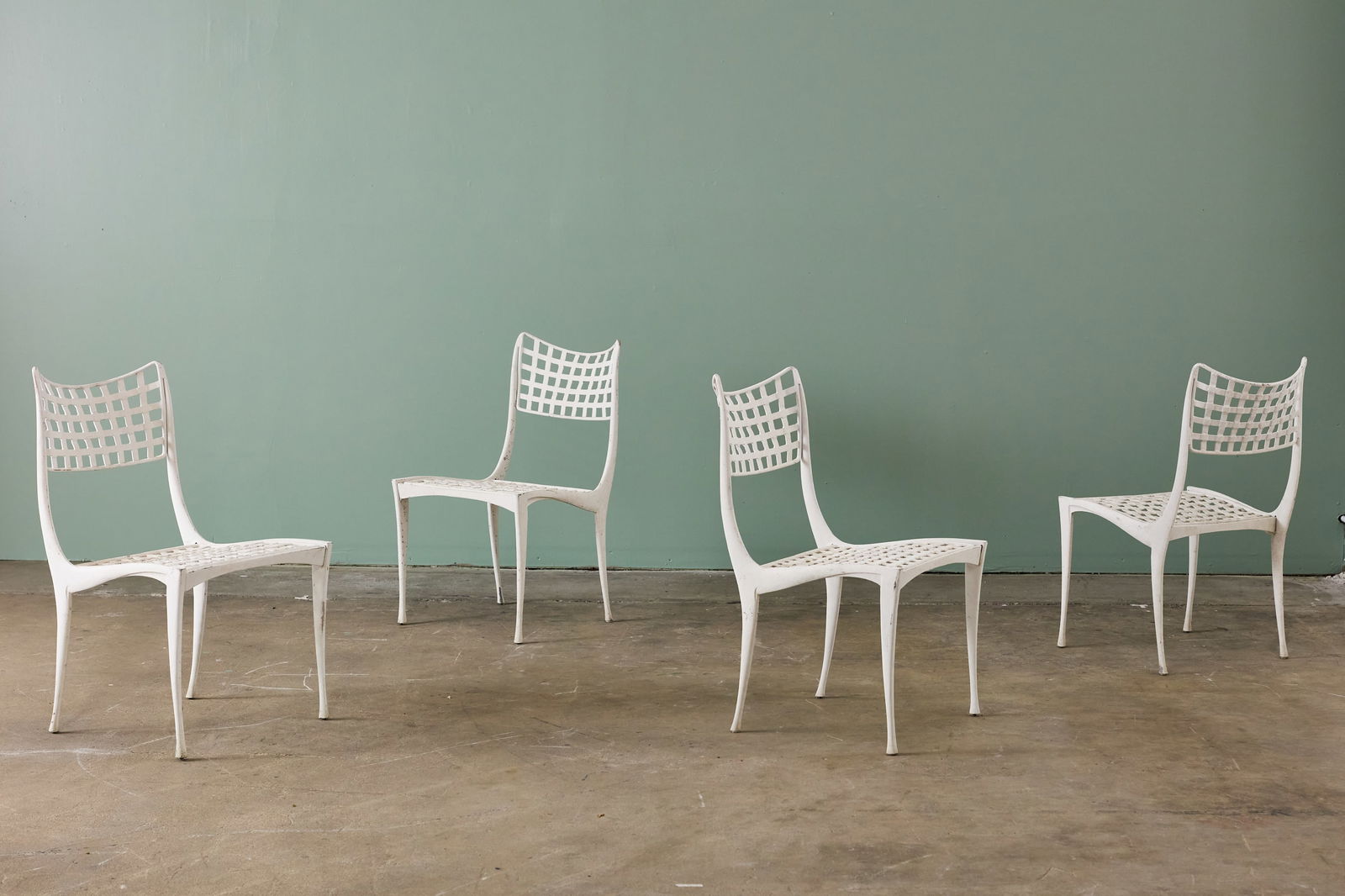 Dan Johnson, 'Sol Y Luna' Chairs (4): DAN JOHNSONSet of four 'Sol Y Luna' chairs, 1960sPainted cast aluminum. Manufactured by Brown Jordan, USA and made in Mexico. Each: 32" H x 18.75" W x 20" DSeat height: 1