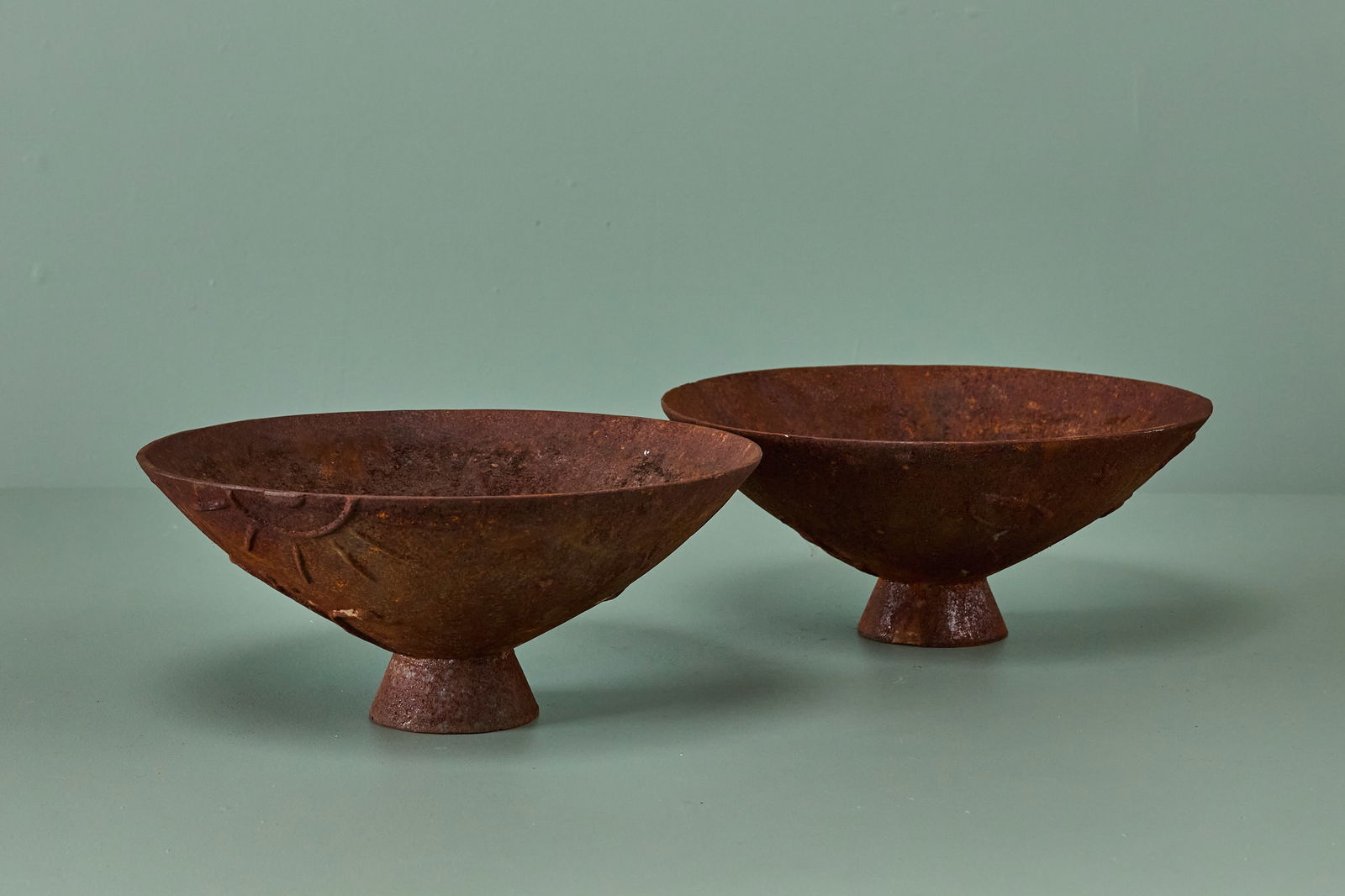 Olof Hult, 'Mikrokosmos' Planters (2): OLOF HULT Pair of 'Mikrokosmos' planters, ca. 1922 Cast iron. Produced by Nafveqvarns Bruk, Sweden. Each: 6.25" H x 15" Diameter These 'Mikrokosmos'