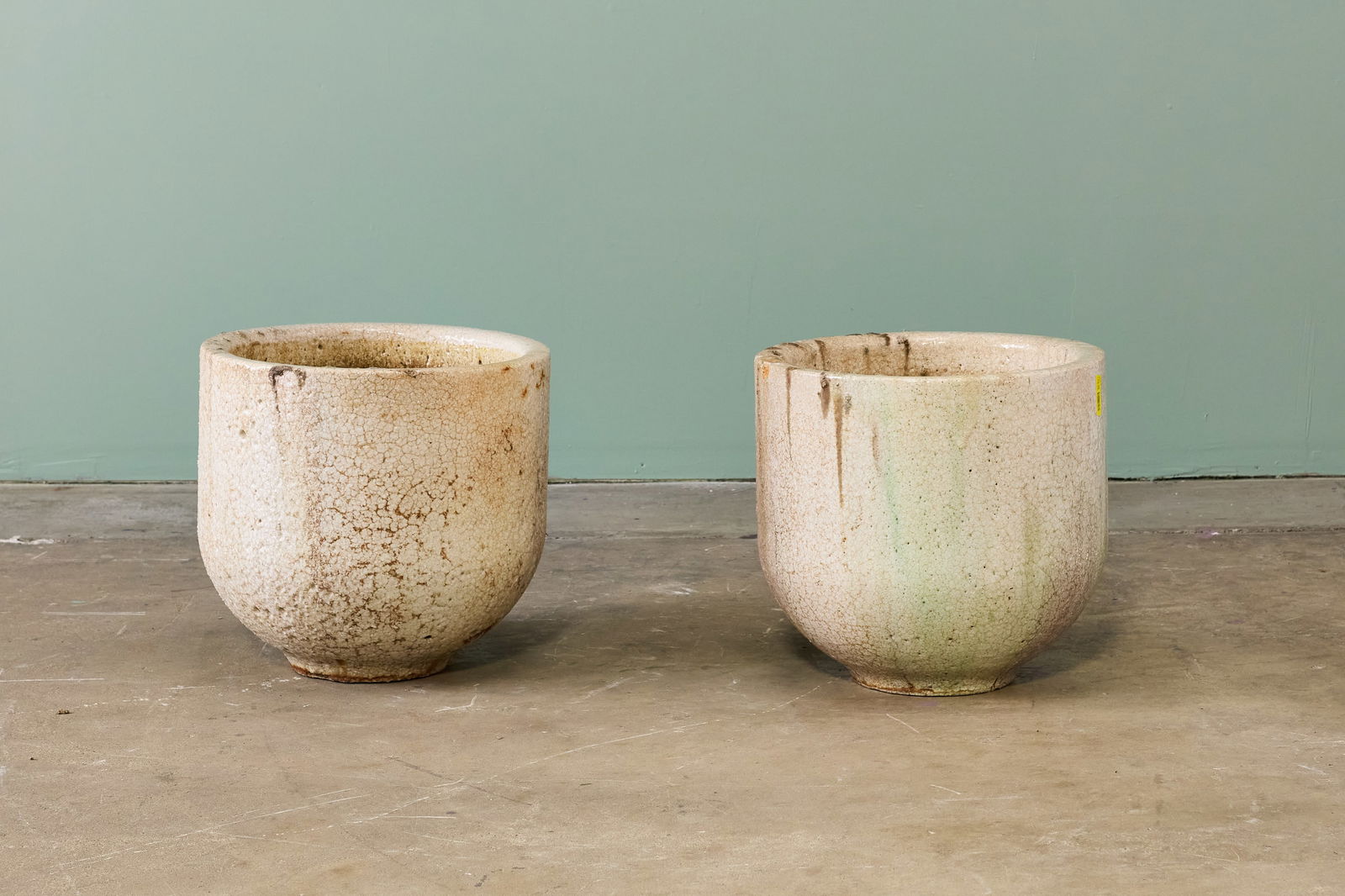 Industrial, Large Crucibles (2): INDUSTRIAL Pair of crucibles, mid-20th century Glazed heat-resistant material. Each: 18" H x 19" Diameter