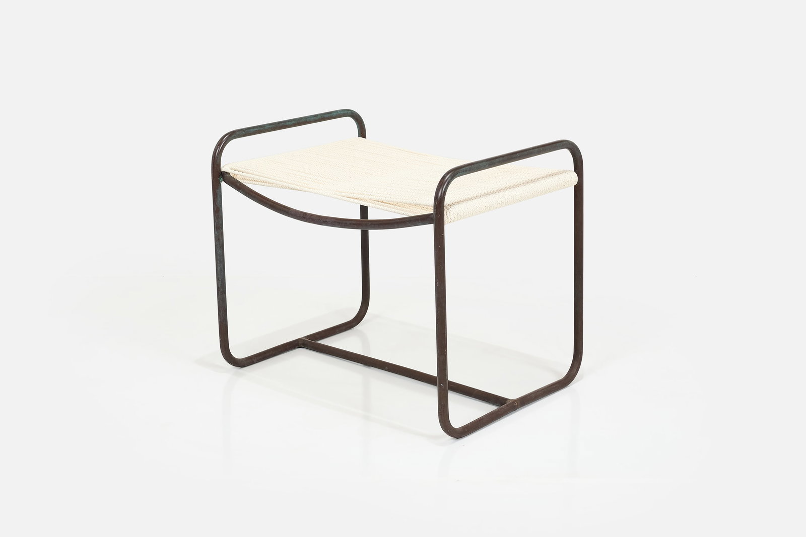 Walter Lamb, Ottoman: WALTER LAMB Ottoman, 1950s Tubular bronze, cotton cording. Manufactured by Brown Jordan, USA. 20" H x 23" W x 18" D