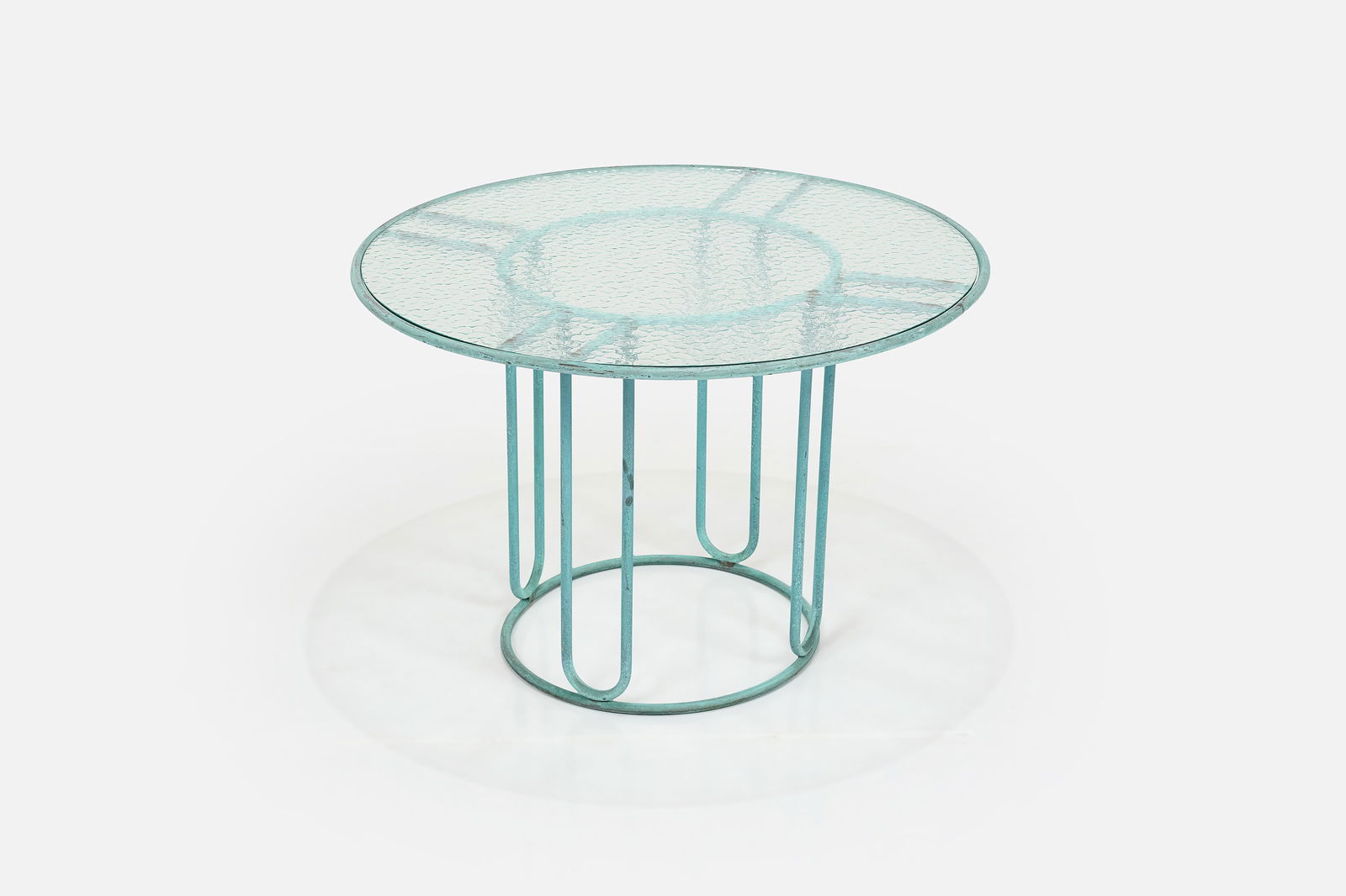 Walter Lamb, Round Dining Table: WALTER LAMBRound dining table, 1950sTubular bronze, glass. Manufactured by Brown Jordan, USA. 29" H x 42.5" Diameter