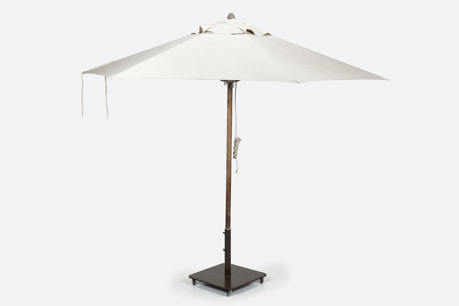 Santa Barbara Designs, 'Santa Barbara' Standing Umbrella: SANTA BARBARA DESIGNSStanding 'Santa Barbara' patio umbrella, 2020sCanvas, teak, steel. Manufactured by Santa Barbara Designs, USA. 9' H x 10' Diameter
