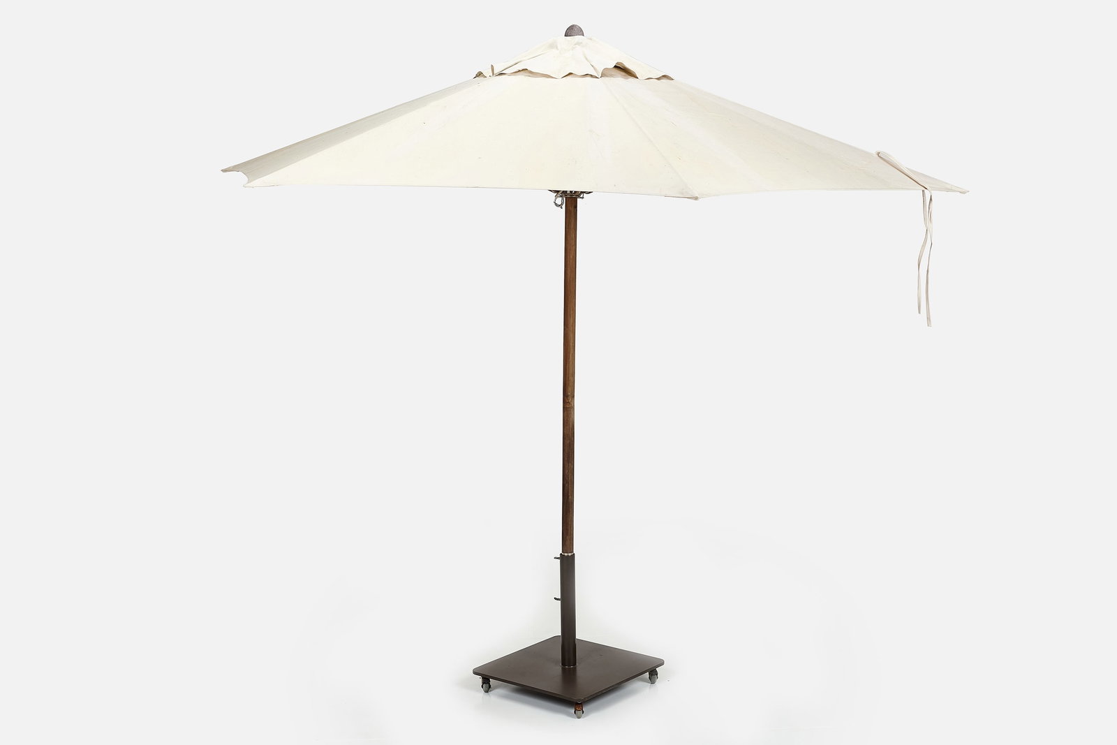 Santa Barbara Designs, 'Santa Barbara' Standing Umbrella: SANTA BARBARA DESIGNSStanding 'Santa Barbara' patio umbrella, 2020sCanvas, teak, steel. Manufactured by Santa Barbara Designs, USA. 9' H x 10' Diameter