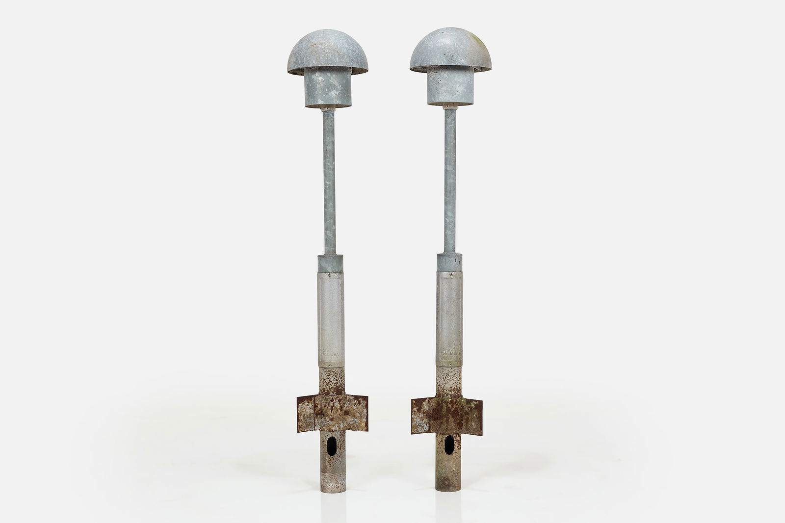 Bjarne Bech, Outdoor Standing Lamps (2): BJARNE BECH Pair of outdoor standing lamps, ca. 1965 Galvanized steel. Manufactured by Louis Poulsen, Denmark. Stem molded with manufacturer's mark and interior with manufacturer's