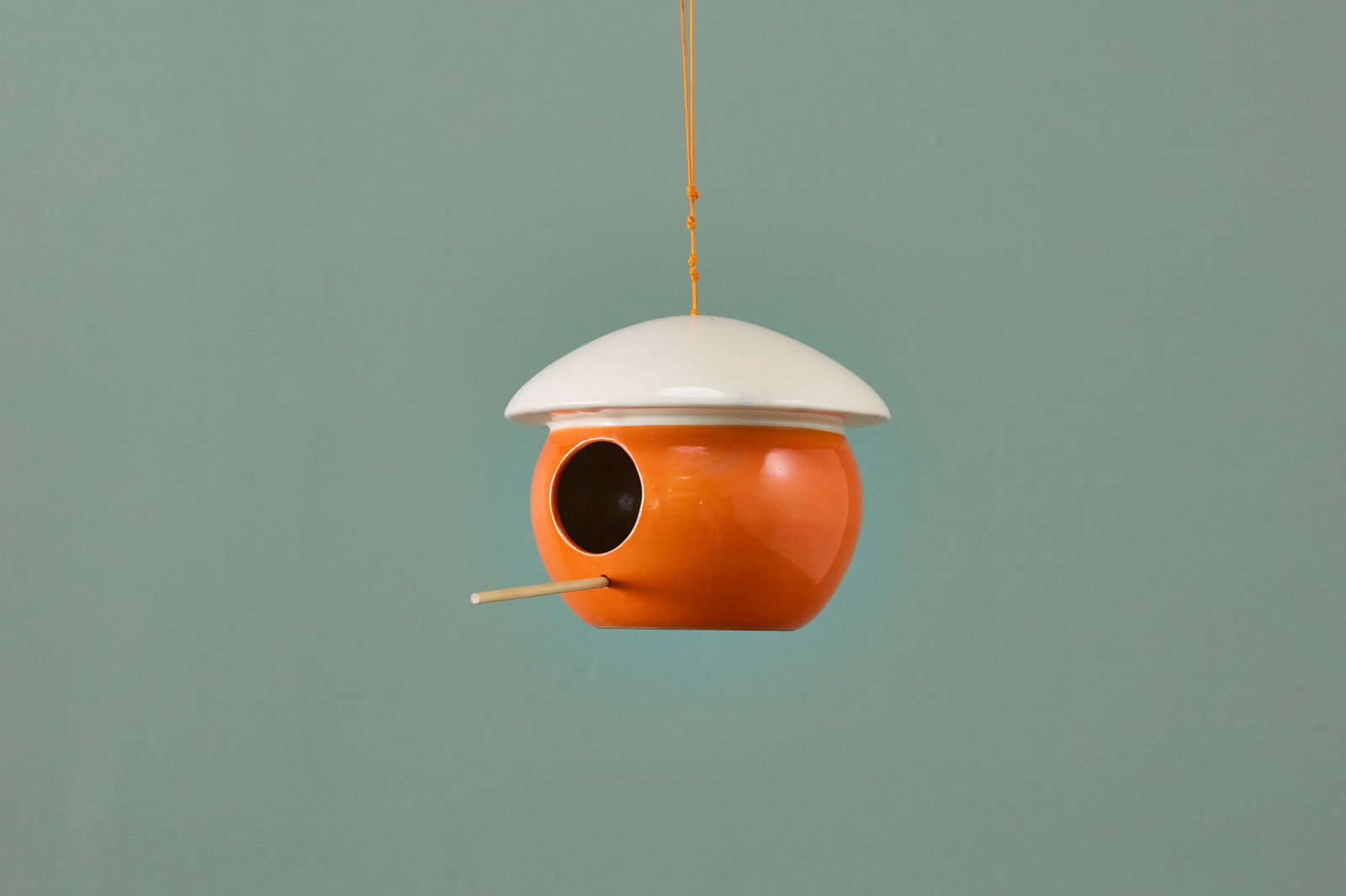 Modernist, Birdhouse: MODERNIST Birdhouse, 1960s Glazed ceramic, wood, nylon. 6" H x 7" Diameter; 11" drop