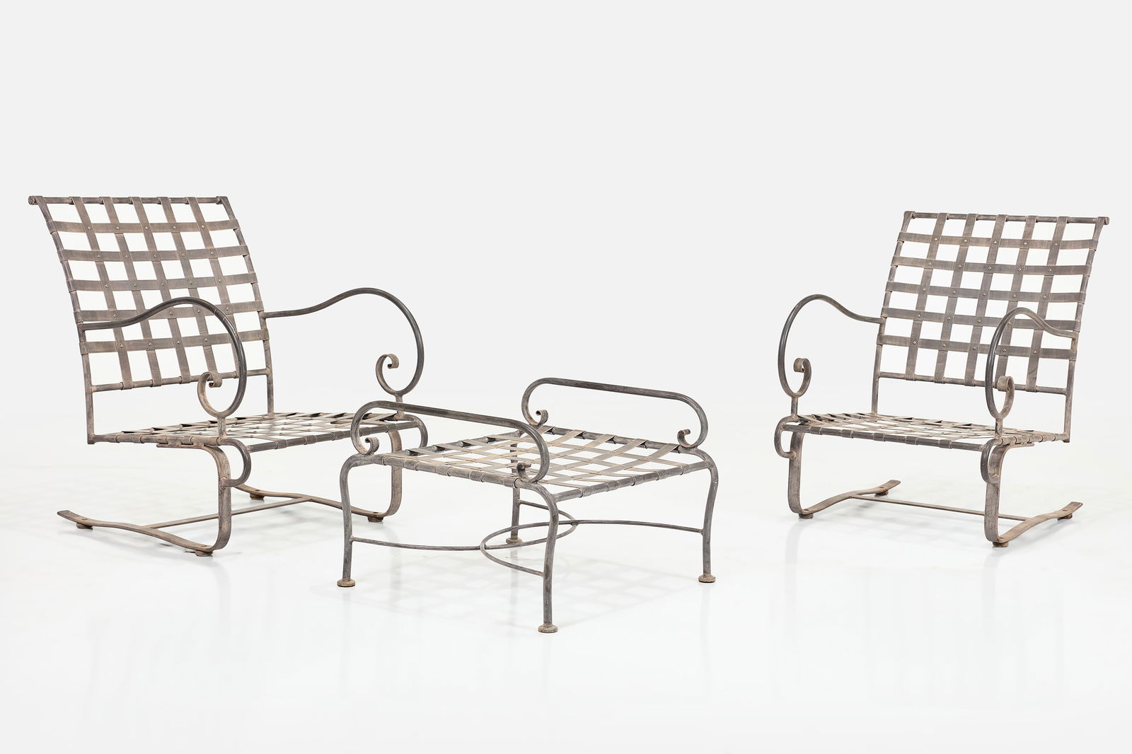 Brian Lee, 'Classico' Lounge Set (3): BRIAN LEEThree-part 'Classico' seating set, 2000sWrought iron. Manufactured by O.W. Lee, USA.Comprising two high-back spring base club chairs and one ottoman. Each chair: 36"