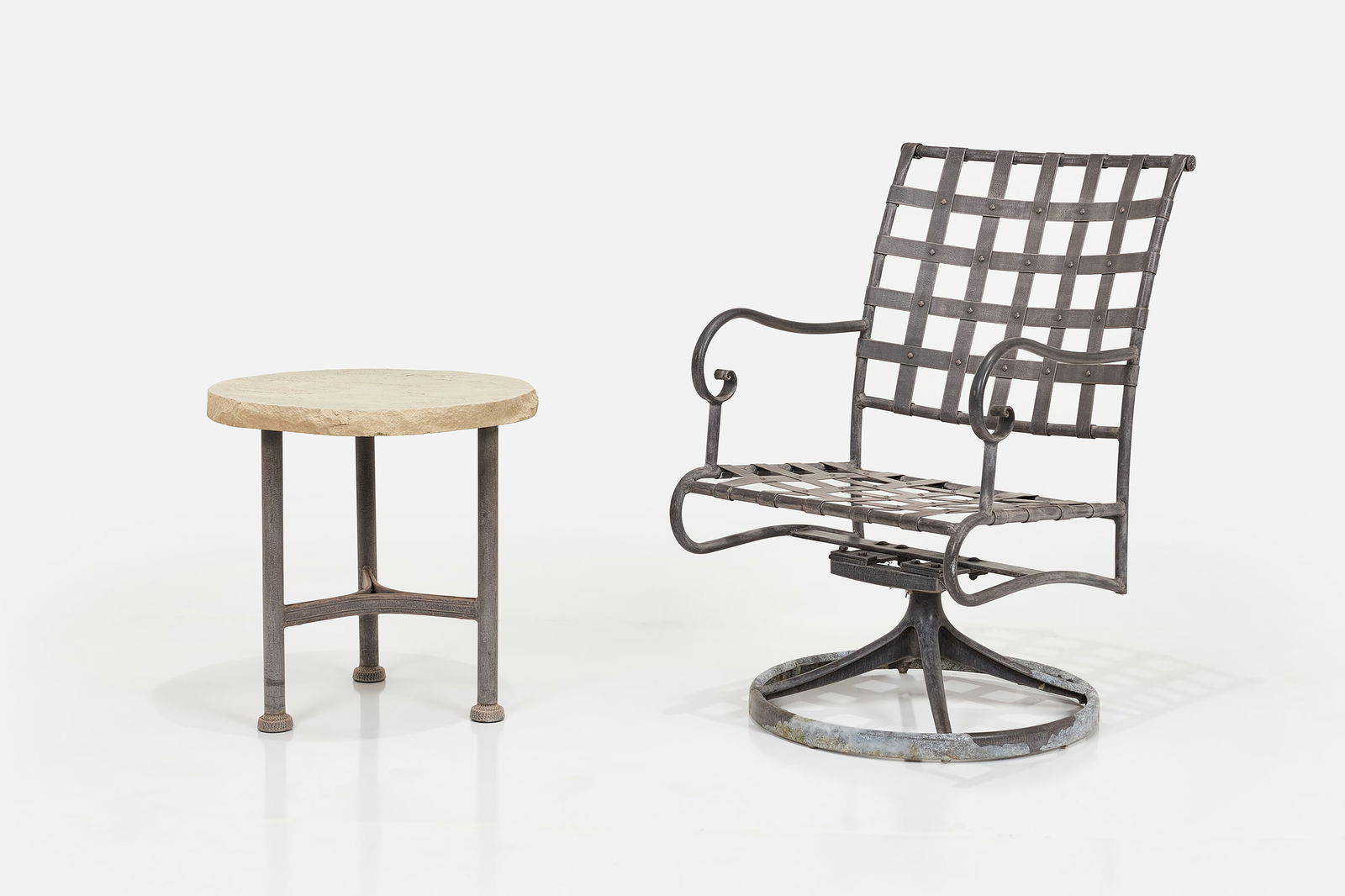 Brian Lee, 'Classico' Swiveling Armchair + Side Table (2): BRIAN LEE Classico' swivel rocking chair and side table, 2000s Wrought iron, faux stone. Manufactured by O.W. Lee, USA. Chair: 35" H x 22" W x 24" D Seat height: