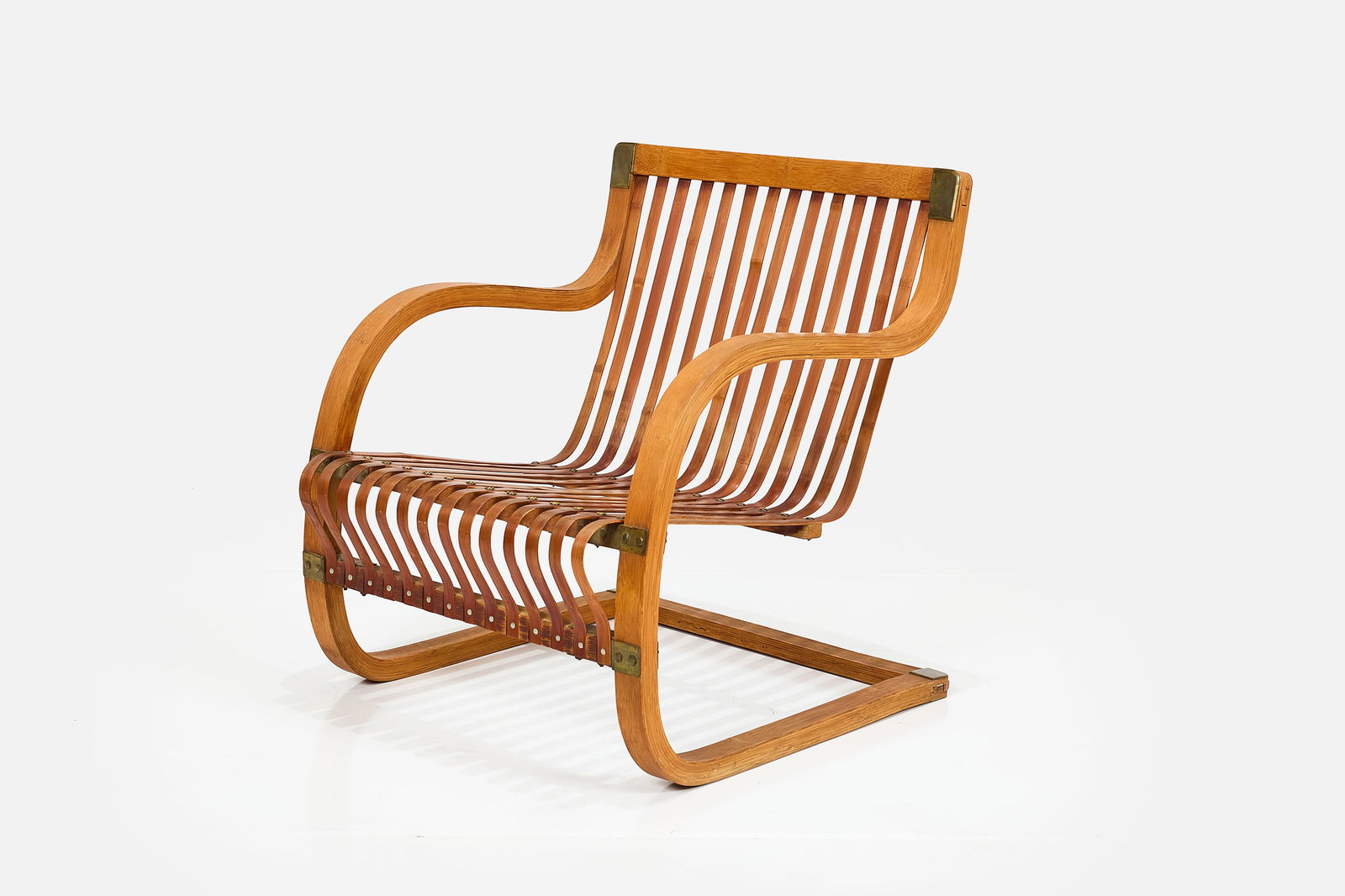 Ubunji Kidokoro, Lounge Chair: UBUNJI KIDOKORO Lounge chair, ca. 1938 Bamboo, brass. Produced by Mitsukoshi Ltd., Japan. Manufacturer's mark to the back. 29.25" H x 25.25" W x 26.5" W Seat height: