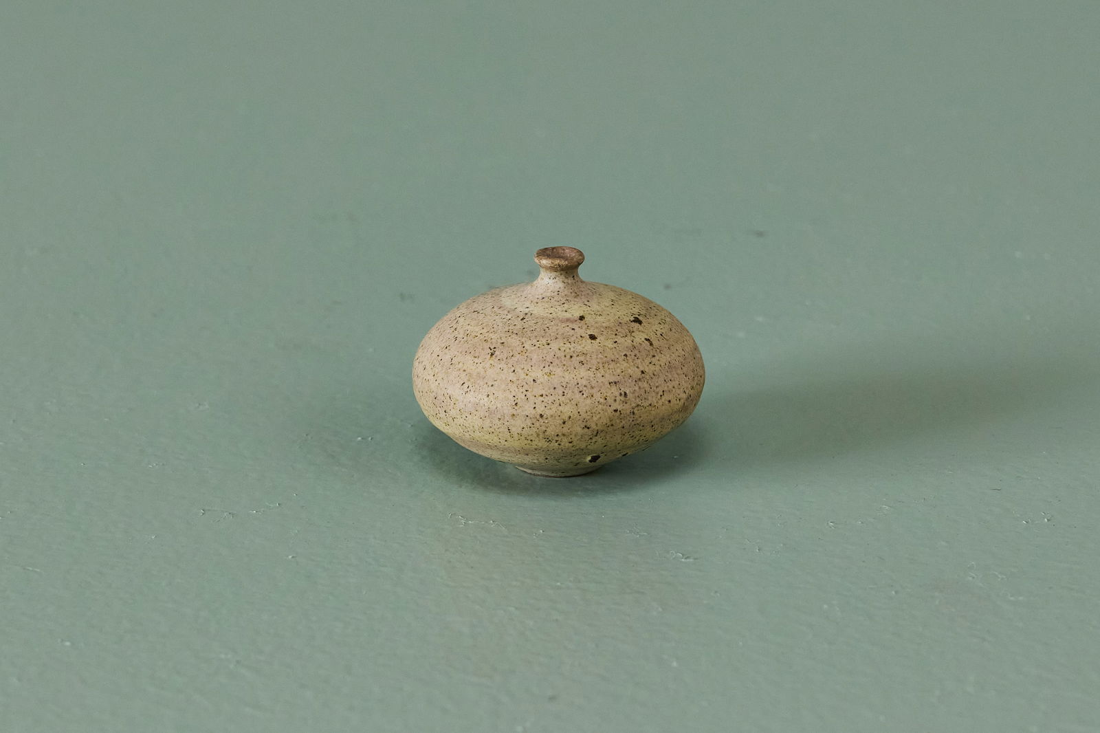 Doyle Lane, Weed Pot: DOYLE LANE Weed pot, late 1960s Glazed stoneware. Studio-made, El Sereno, CA. Underside with incised signature. 2" H x 2.5" Diameter