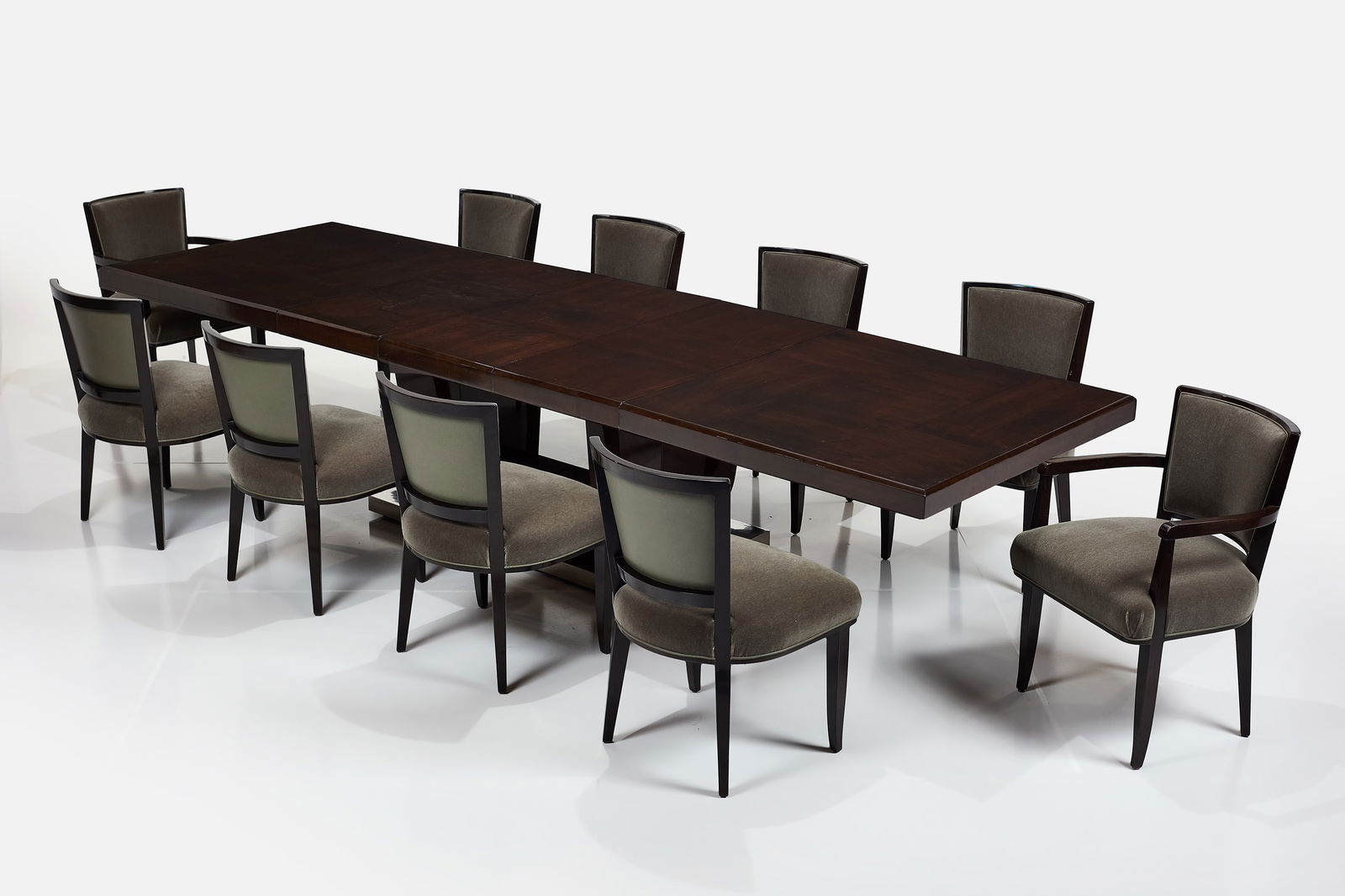 Rene Joubert + Philippe Petit, Dining Set (11): RENE JOUBERT + PHILIPPE PETIT Dining set, ca. 1930 Table: rosewood, nickel-plated metal; chairs: ebonized wood, velvet. Table produced by Joubert et Petit, France, and chairs made in
